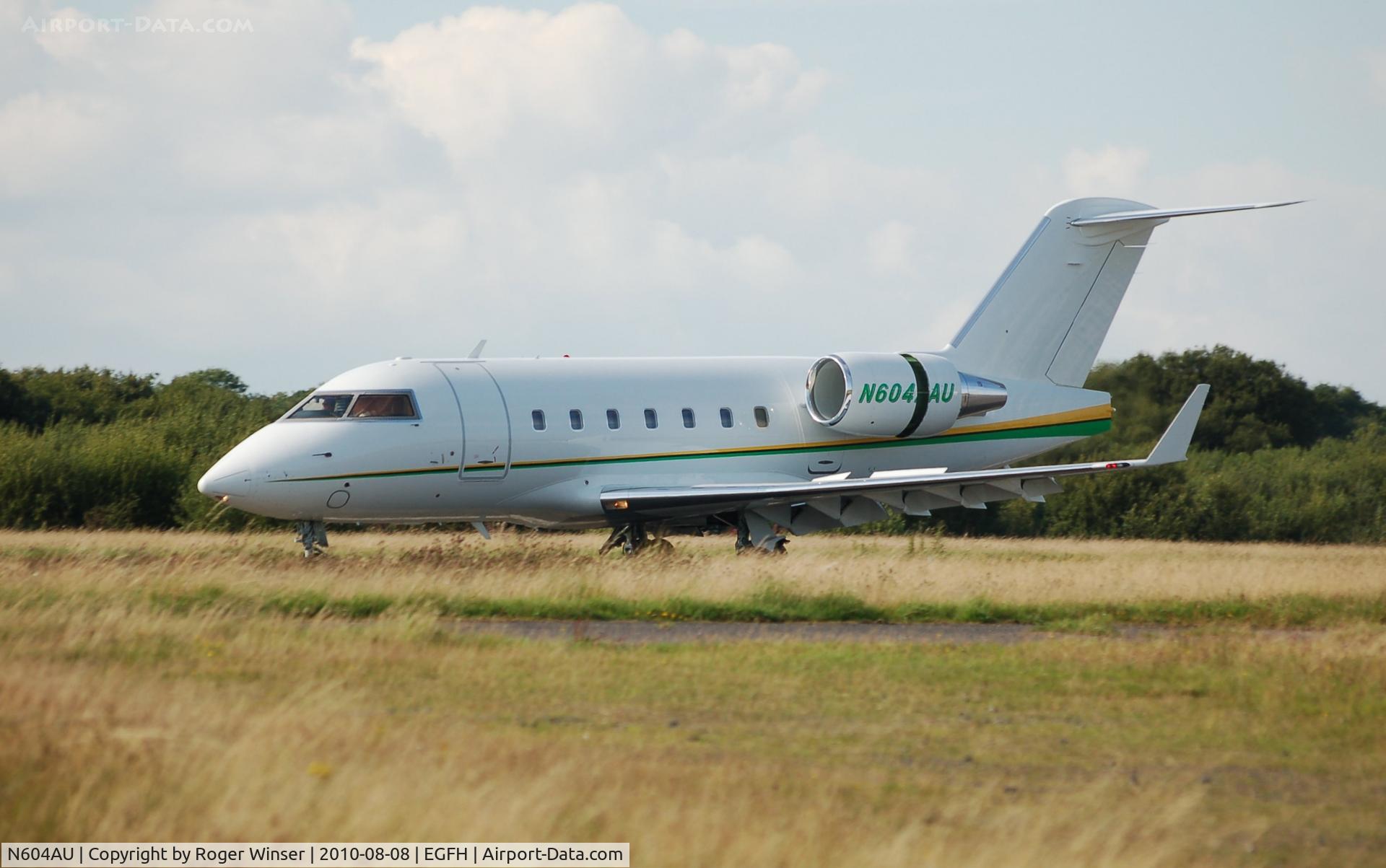 N604AU, 1999 Bombardier Challenger 604 (CL-600-2B16) C/N 5434, Anza Aviation's Challenger 604 arriving Runway 22. Ex-N322BX