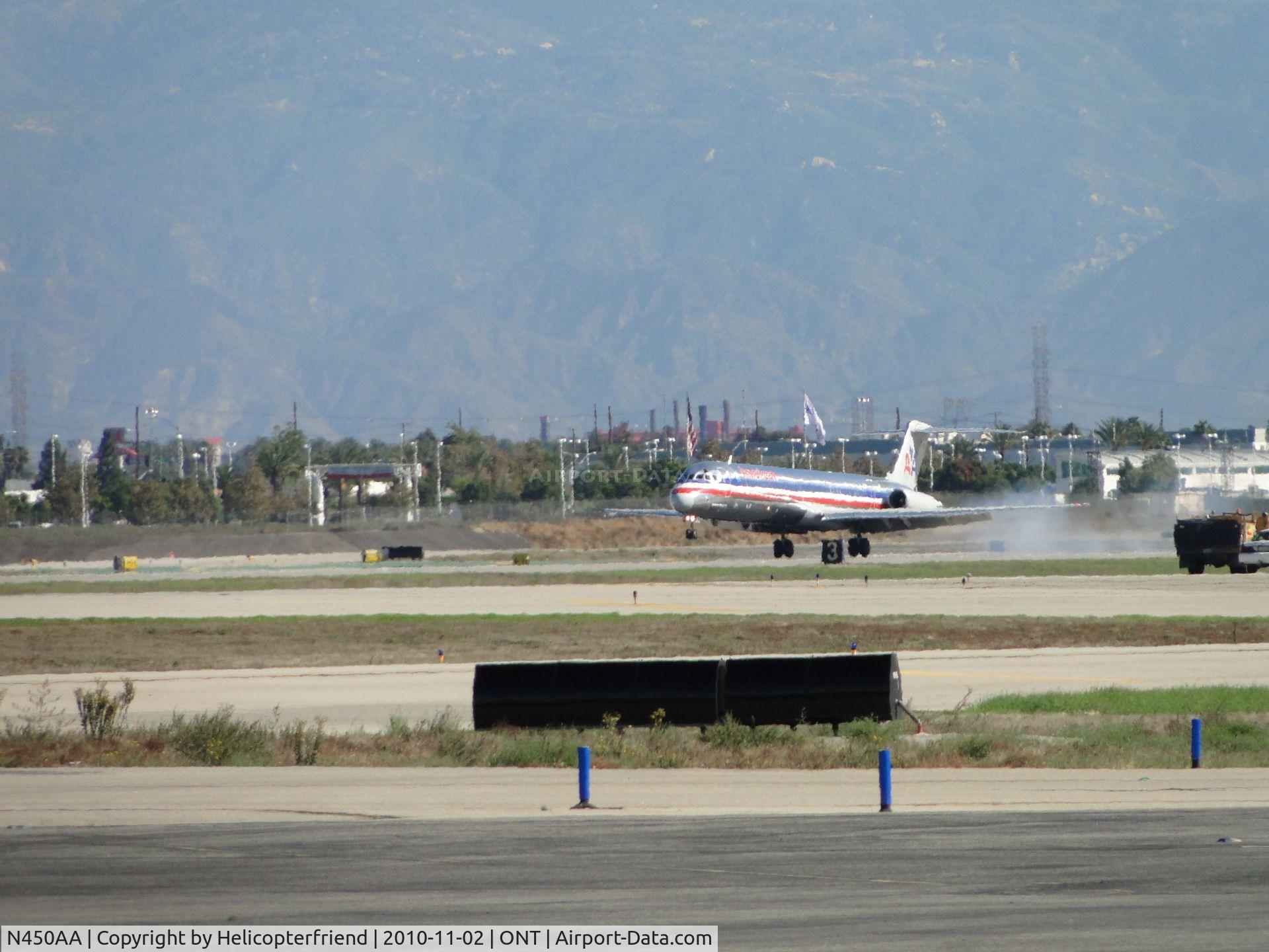 N450AA, 1987 McDonnell Douglas MD-82 (DC-9-82) C/N 49476, Wheels smoke at touch down on runway 26R