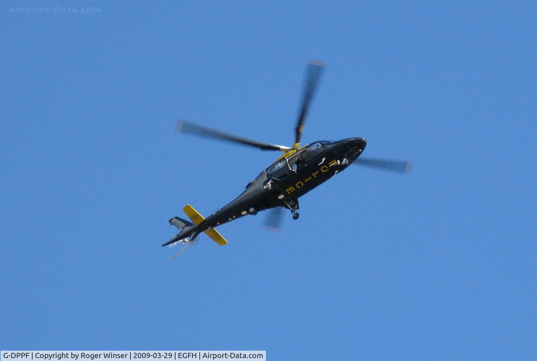 G-DPPF, 2003 Agusta A-109E Power C/N 11216, Dyfed-Powys Police Air Support Unit helicopter hovers over Swansea Airport.