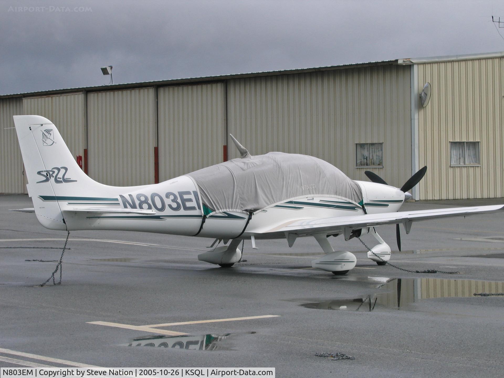 N803EM, 2003 Cirrus SR22 C/N 0457, 2003 Cirrus Design SR22 buttoned up for rain @ San Carlos, CA home base (sold to owner in Iowa in May 2007)