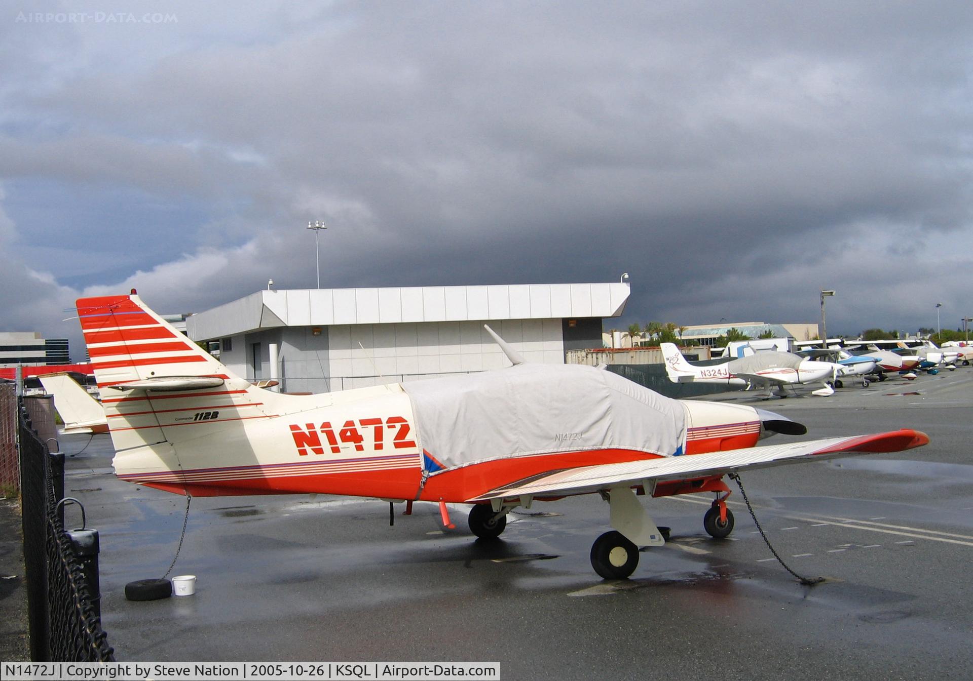 N1472J, 1977 Rockwell International 112B Commander C/N 536, Anticipating rain the owner of this 1977 Rockwell International 112B has her cockpit covered @ San Carlos, CA