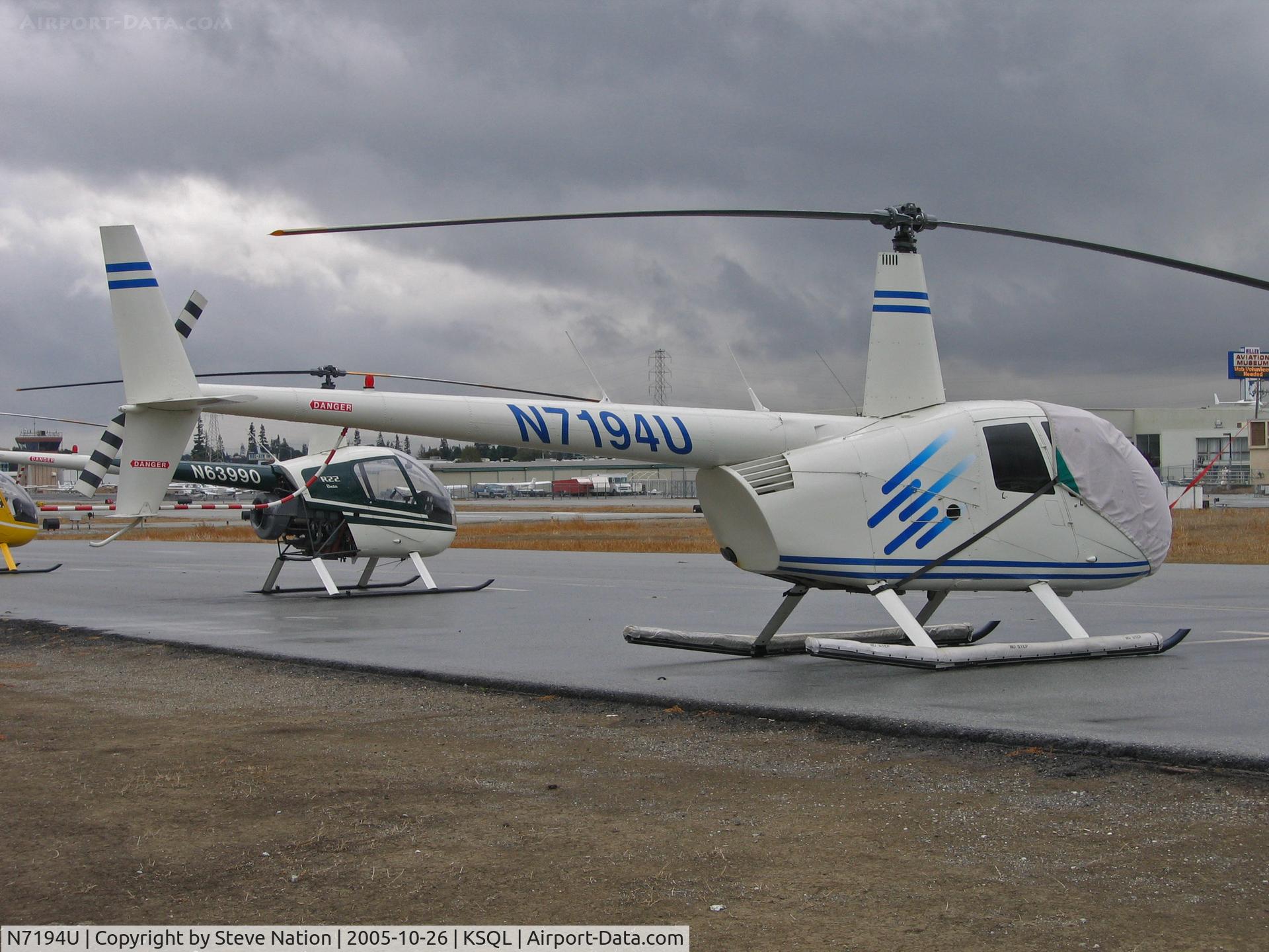 N7194U, 2001 Robinson R44 C/N 0975, 2001 Robbie R44 mostly uncovered @ San Carlos, CA
