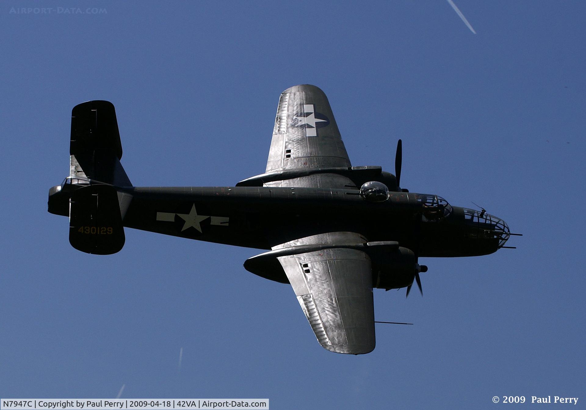 N7947C, 1944 North American B-25J Mitchell Mitchell C/N Not found 44-30129/N7947C, In the sun, she looks even darker than she is