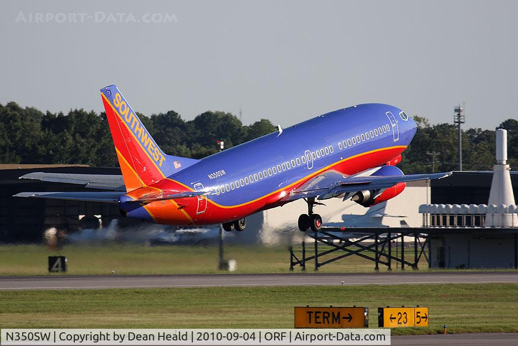 N350SW, 1989 Boeing 737-3H4 C/N 24409, Southwest Airlines N350SW (FLT SWA186) departing RWY 23 en route to Baltimore/Washington Int'l (KBWI) with the Norfolk VOR in the background.