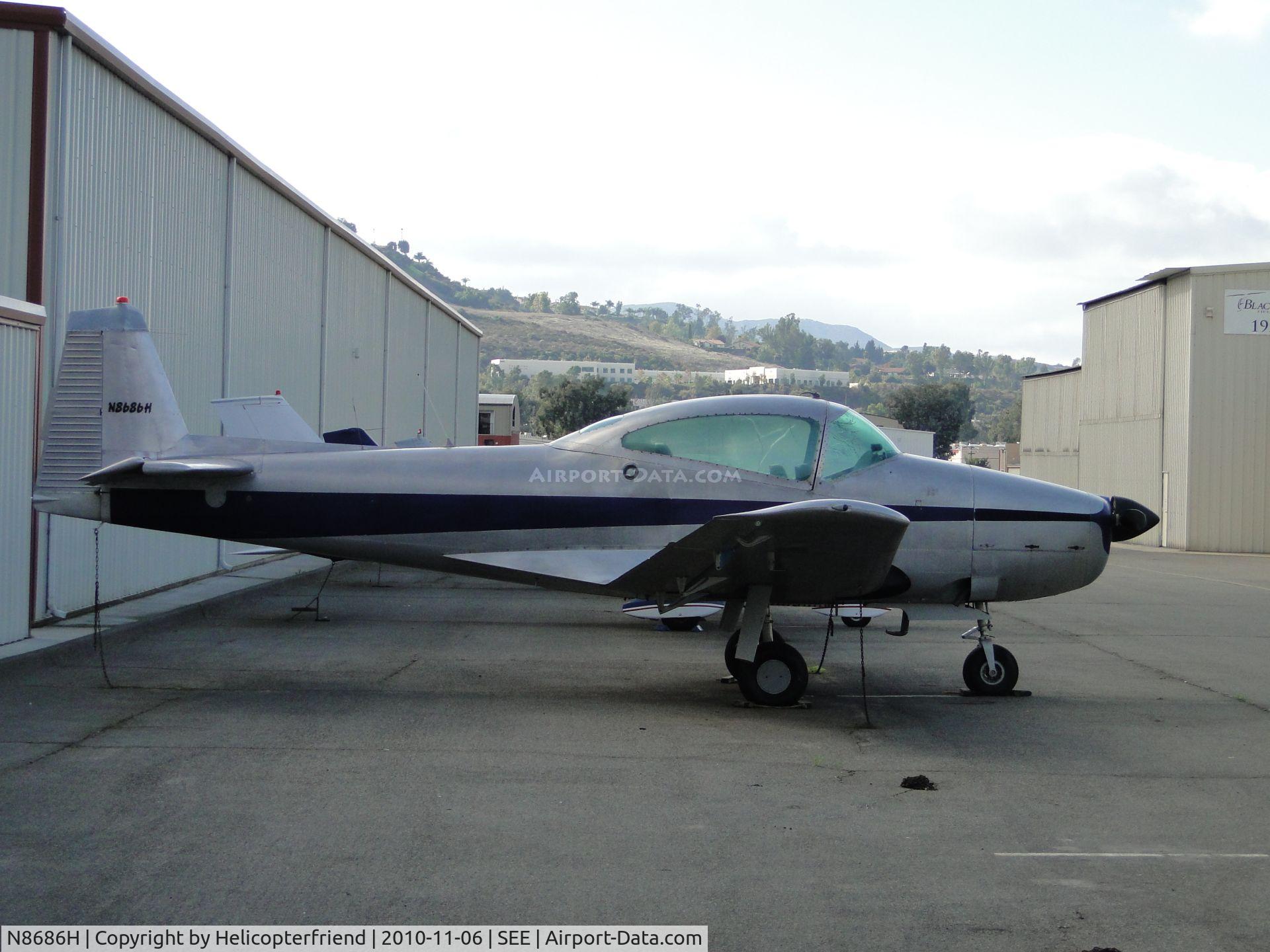 N8686H, 1947 North American NAVION C/N NAV-4-686, Tied down and parked near the hanger
