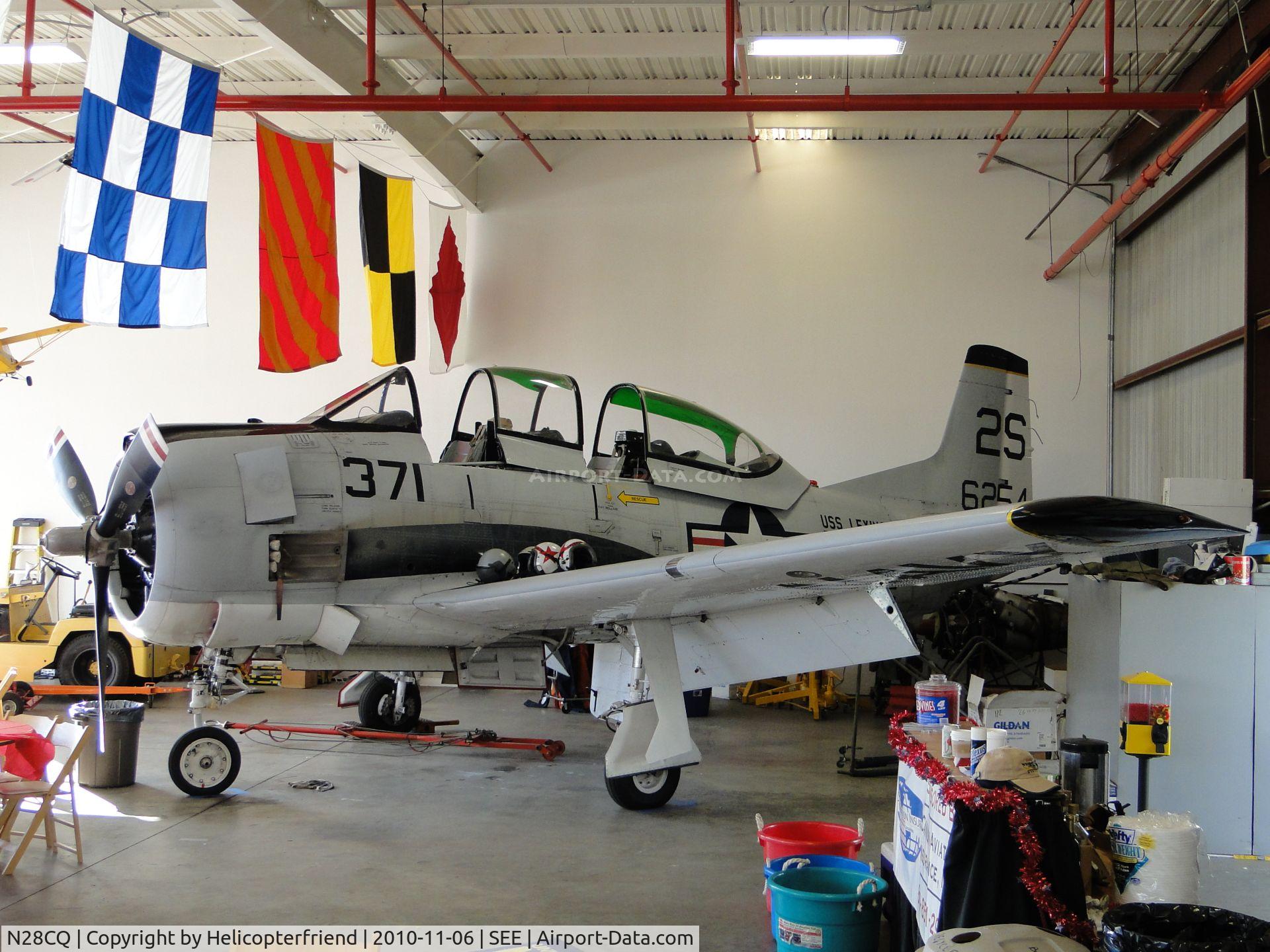 N28CQ, 1957 North American T-28C Trojan Trojan C/N 252-17, (c/n 252-17) to civil registry as N254PJ, later N28CQ based at El Cajon, CA.

Parked in hanger