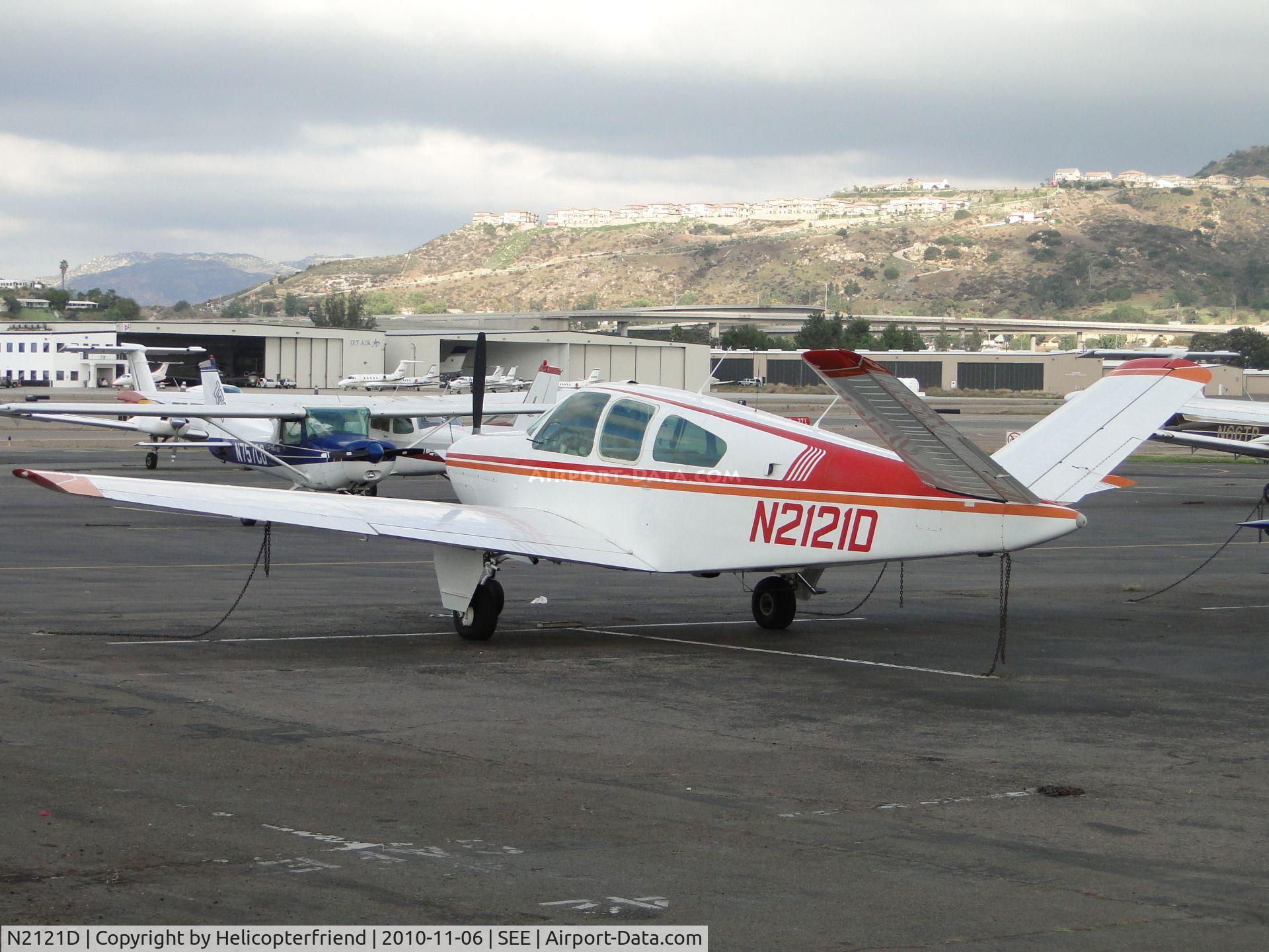 N2121D, 1953 Beech D35 C/N D-3466, Parked near the control tower