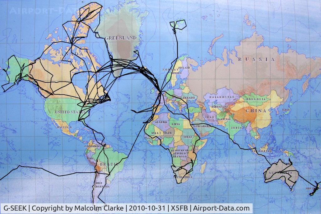 G-SEEK, 1982 Cessna T210N Turbo Centurion C/N 21064579, A close-up of the map applied to Earthrounder Andy Hopper's Cessna T210N illustrating the many global flights this aircraft has undertaken.