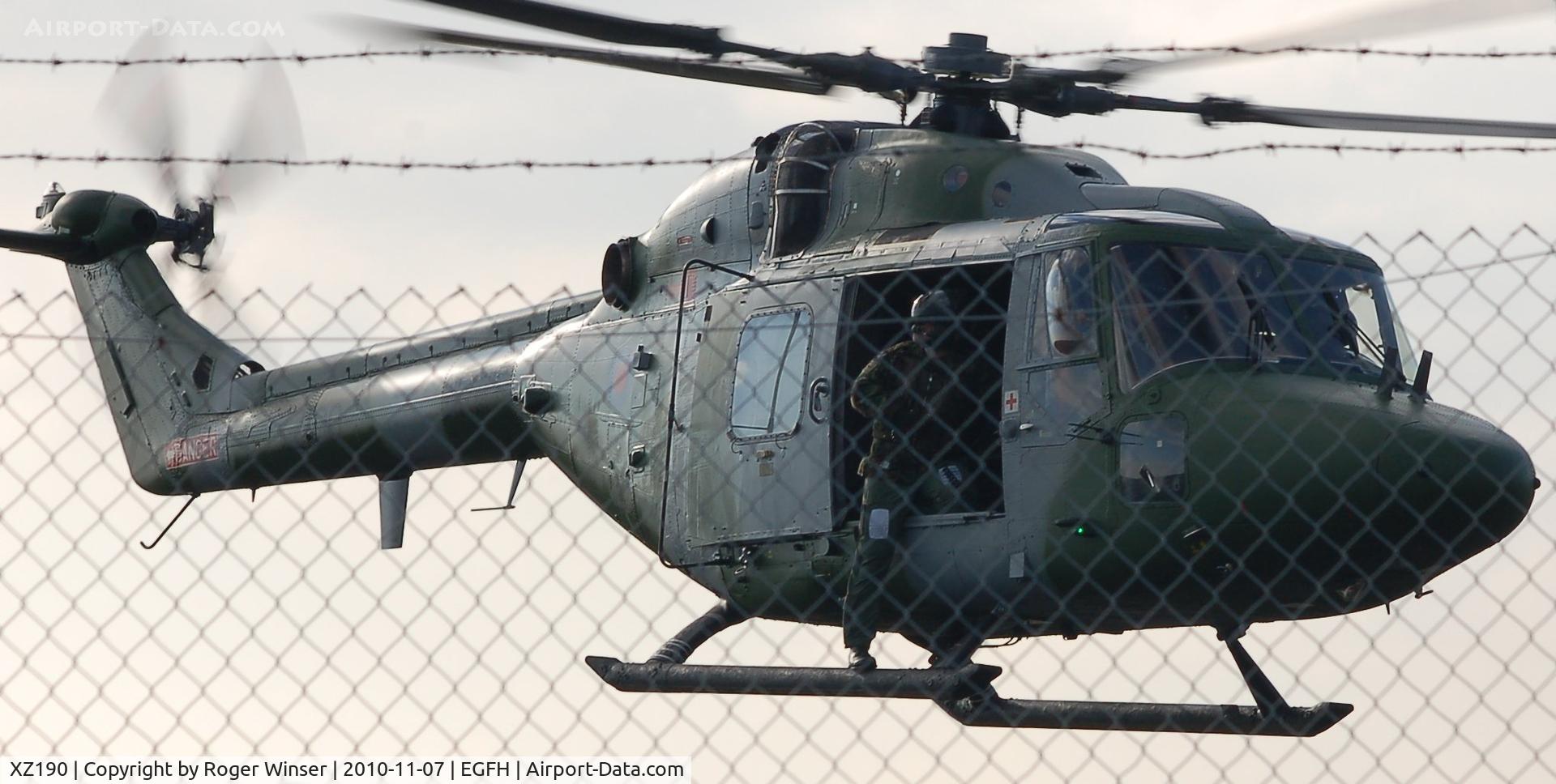 XZ190, 1978 Westland Lynx AH.7 C/N 082, Through the fence. AAC Lynx departing Swansea Airport.
