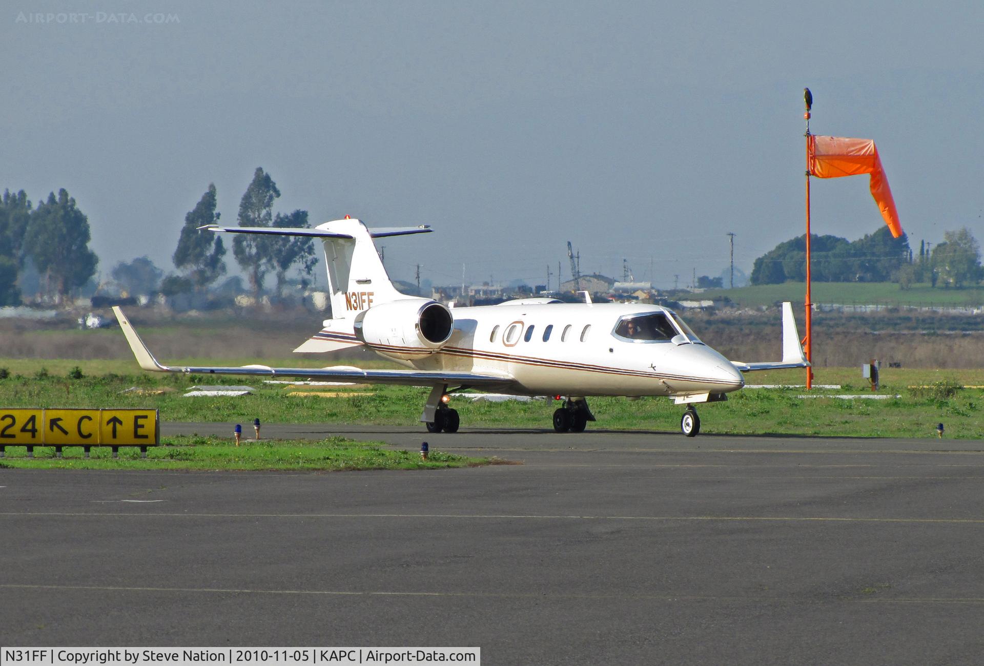 N31FF, Learjet Inc 31A C/N 053, J.H. Siroonian (Fresno, CA) 1992 Learjet 31A operated by Delta Air Elite Biz Jets arrives from KPSP/Palm Springs, CA in beautiful sunlight as 