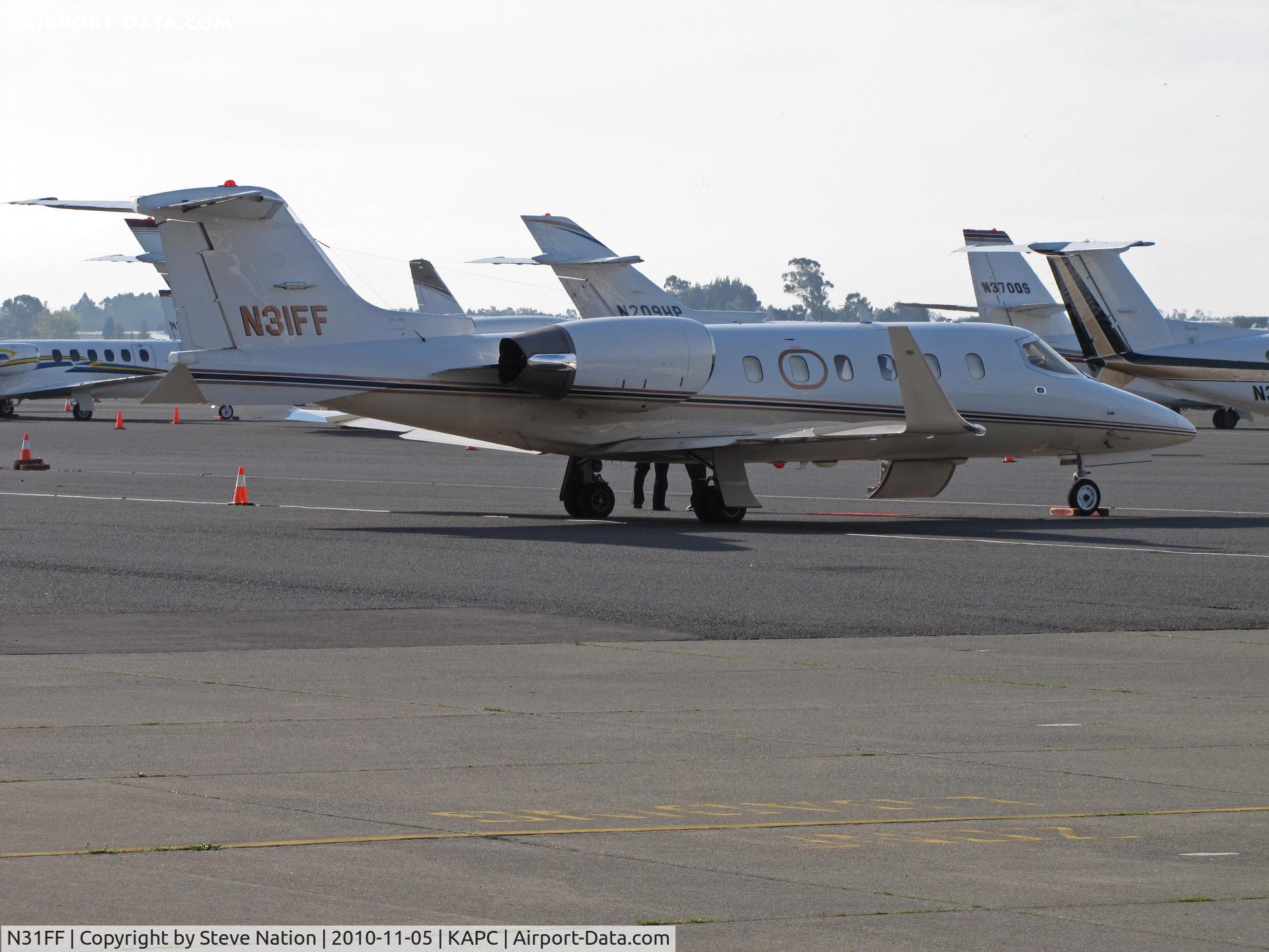 N31FF, Learjet Inc 31A C/N 053, 1992 Learjet 31A operated by Delta Air Elite Biz Jets on bizjet ramp at KAPC/Napa County, CA