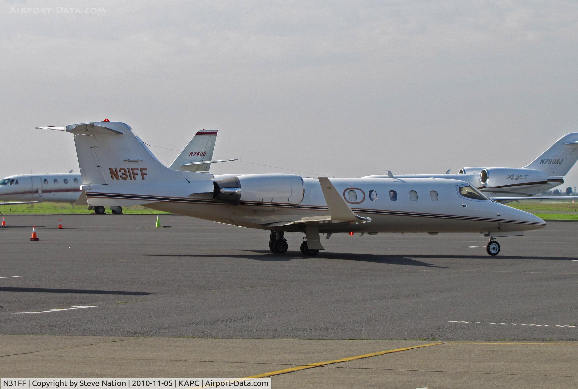 N31FF, Learjet Inc 31A C/N 053, 1992 Learjet 31A operated by Delta Air Elite Biz Jets departs bizjet ramp at KAPC/Napa County, CA for KPHX/Sky Harbor Intl Airport, Phoenix, AZ as 