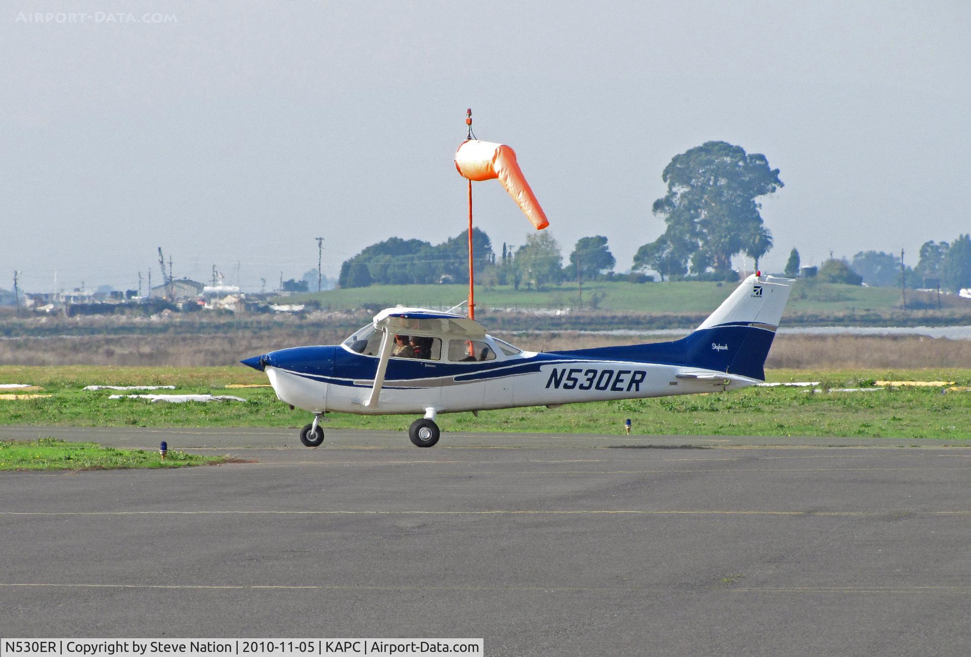 N530ER, 2002 Cessna 172S C/N 172S9113, 2002 Cessna 172S making off with windsock (or so it seems) @ Napa, CA
