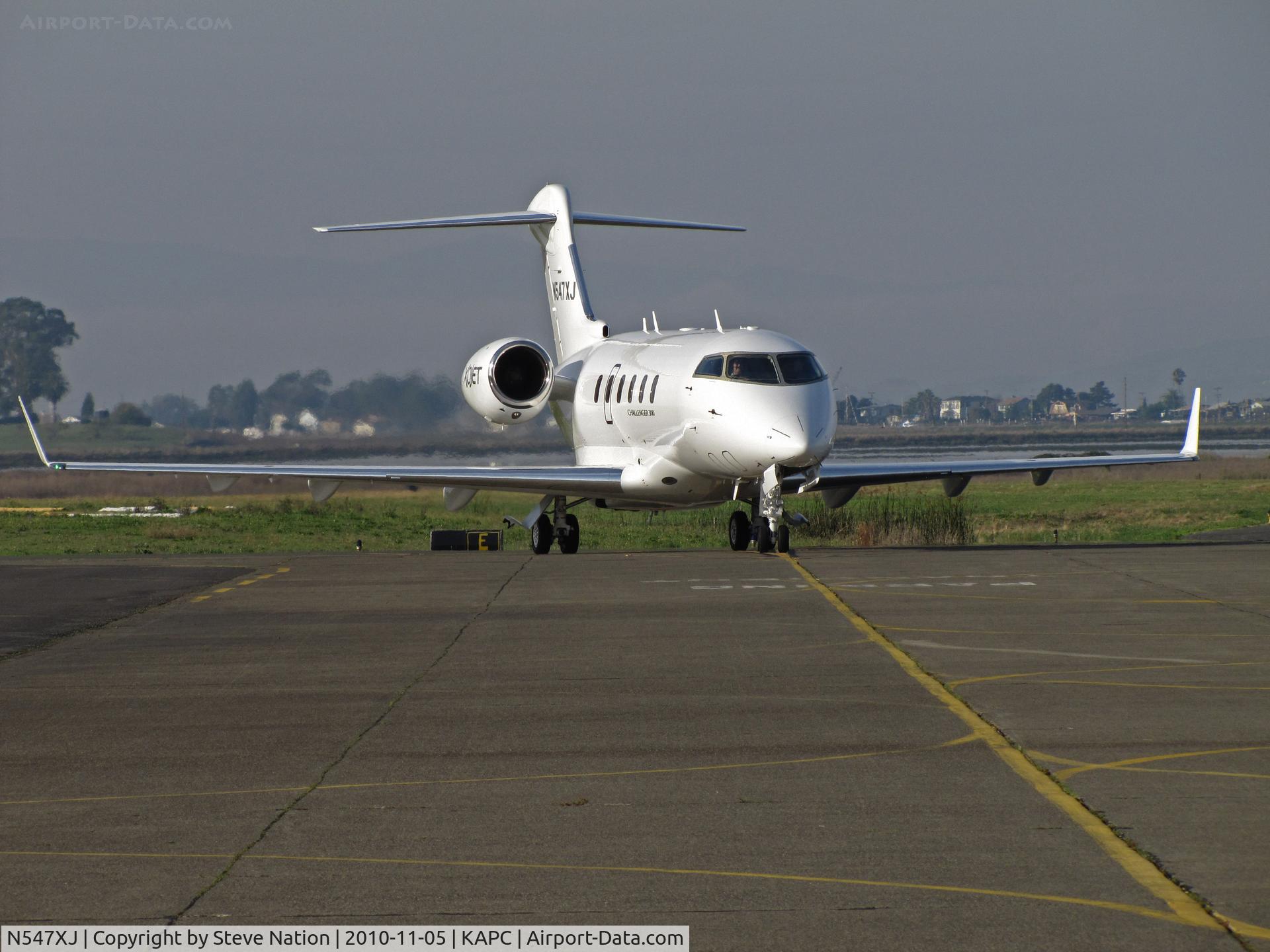 N547XJ, 2009 Bombardier Challenger 300 (BD-100-1A10) C/N 20281, Head on of XOJET 2009 Challenger BD-100-1A10 arriving from KSDL/Scottsdale, AZ