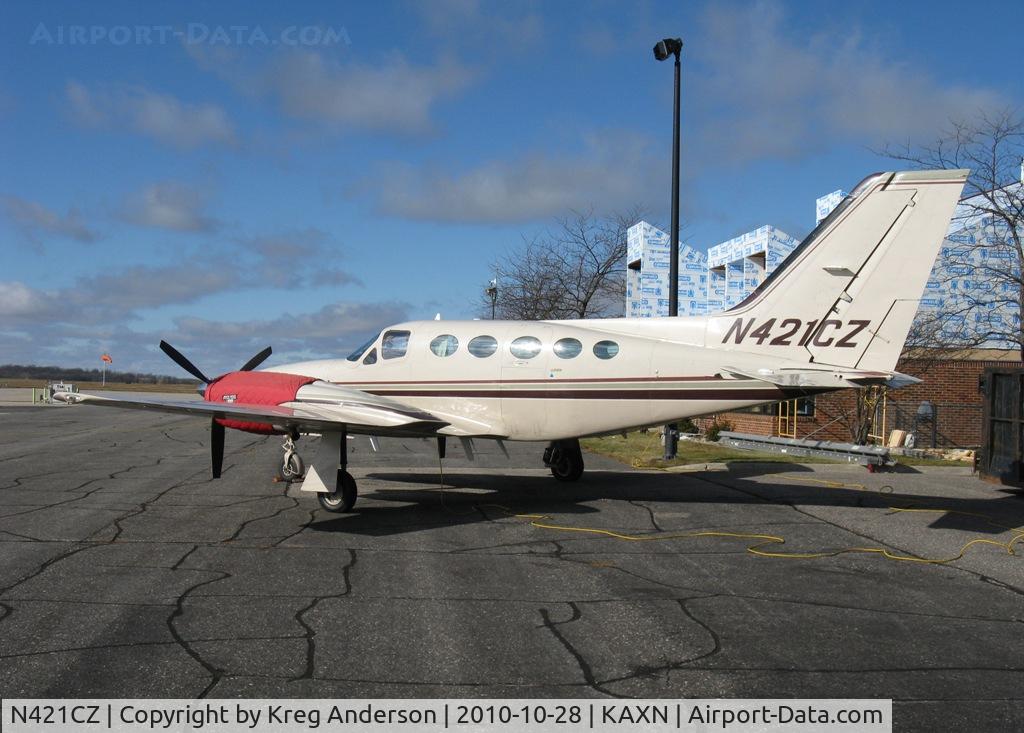 N421CZ, Cessna 421C Golden Eagle C/N 421C1095, Cessna 421C Golden Eagle plugged in on the ramp.