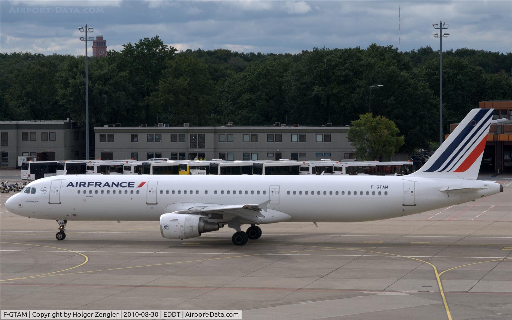 F-GTAM, 2002 Airbus A321-211 C/N 1859, Leaving parking position for take off to Paris CDG on runway 26R.