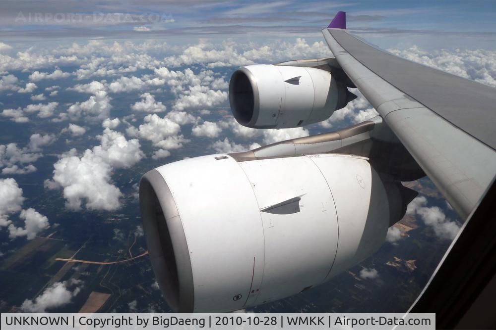 UNKNOWN, Airliners Various C/N Unknown, Photo was taken from lavatory window of A340-500, Thai Airways' flight from Kuala Lumpur to Bangkok on 28 OCT 2010. The flight just left Kuala Lumpur