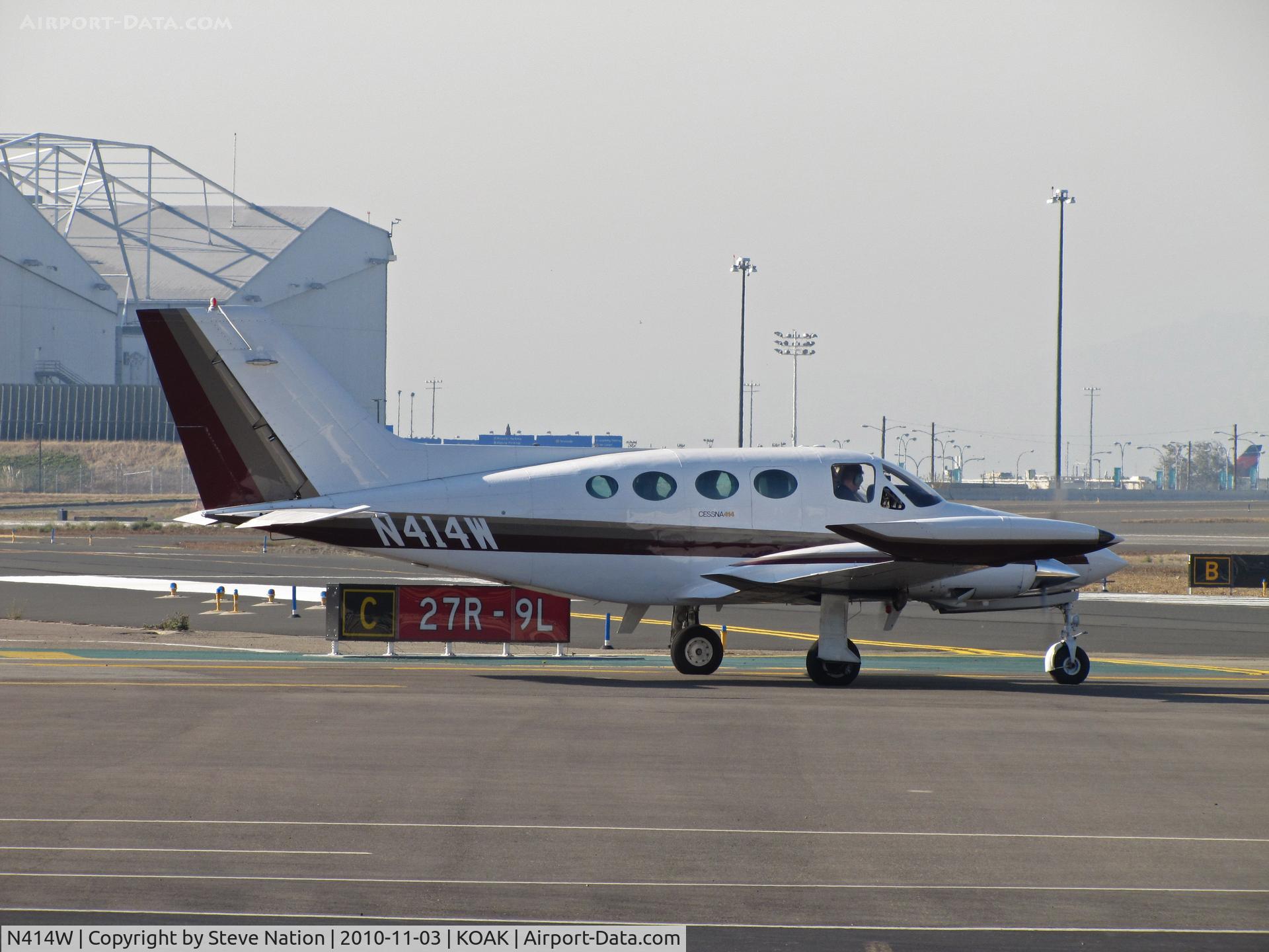 N414W, 1969 Cessna 414 Chancellor C/N 414-0025, Locally-based 1969 Cessna 414 ready to roll from North Field