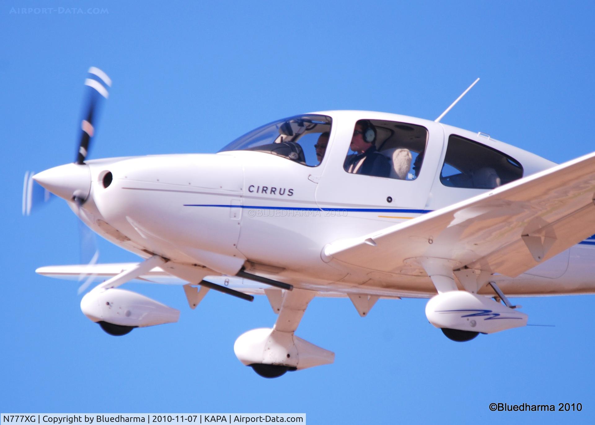 N777XG, 2004 Cirrus SR20 C/N 1428, On final to 17L.