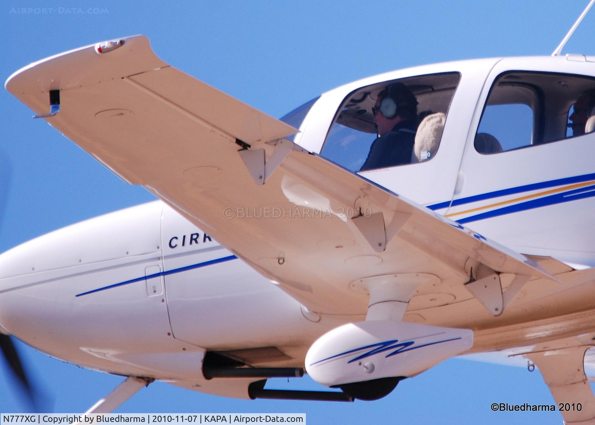 N777XG, 2004 Cirrus SR20 C/N 1428, On final to 17L.