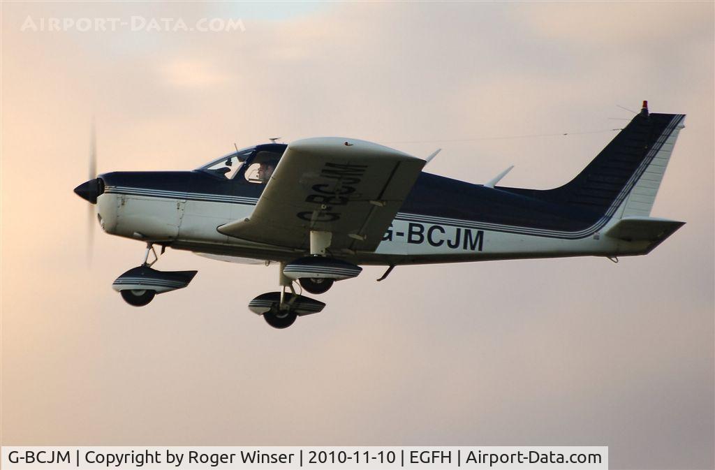 G-BCJM, 1974 Piper PA-28-140 Cherokee Cruiser C/N 28-7425321, Piper Cherokee departing at dusk for a local flight