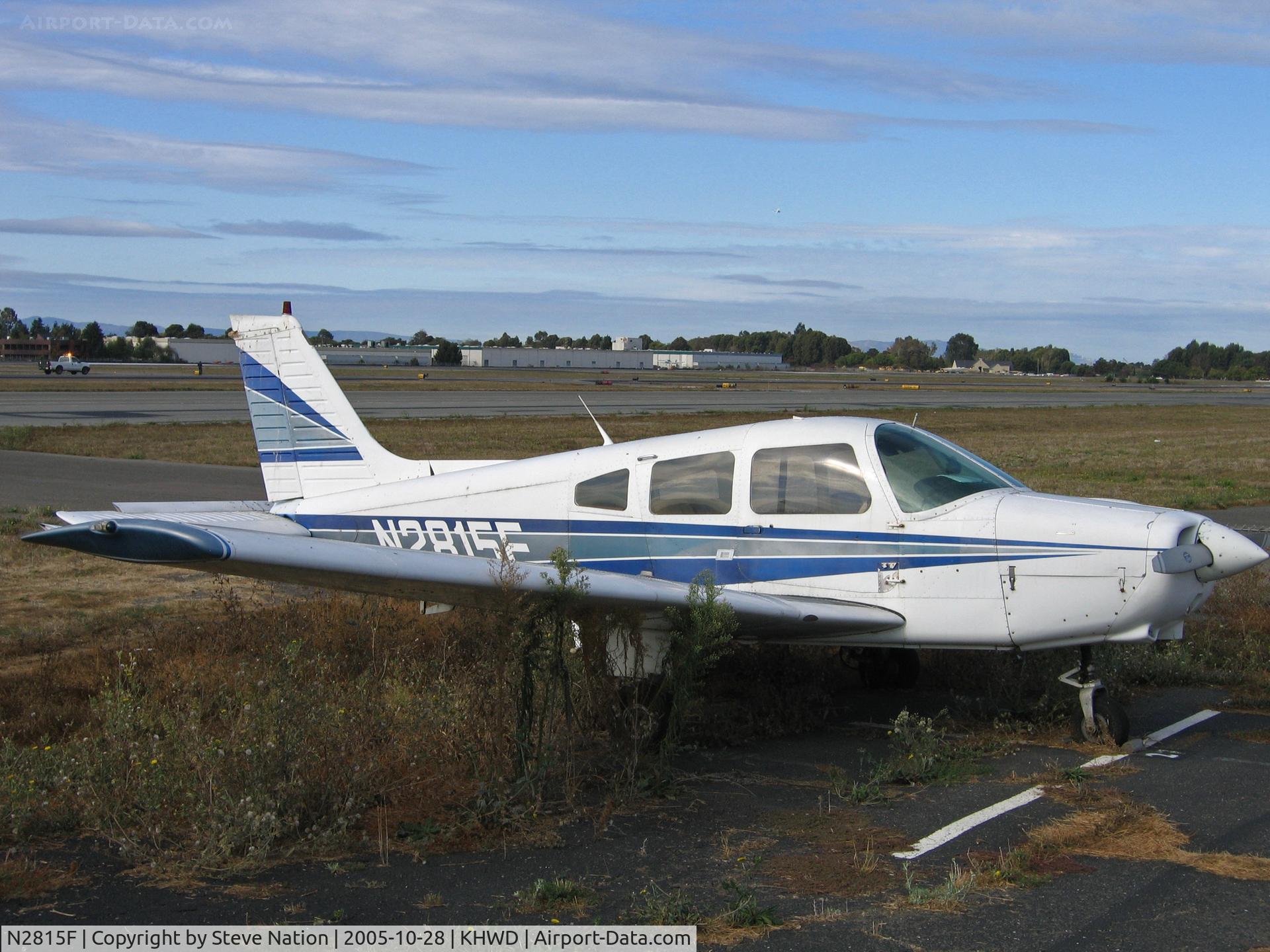 N2815F, 1979 Piper PA-28-161 Cherokee Warrior II C/N 28-7916438, 1979 Piper PA-28-161 knee deep in weeds @ Hayward, CA home base in Oct 2005 (to new owner in Victorville CA by Dec 2008)