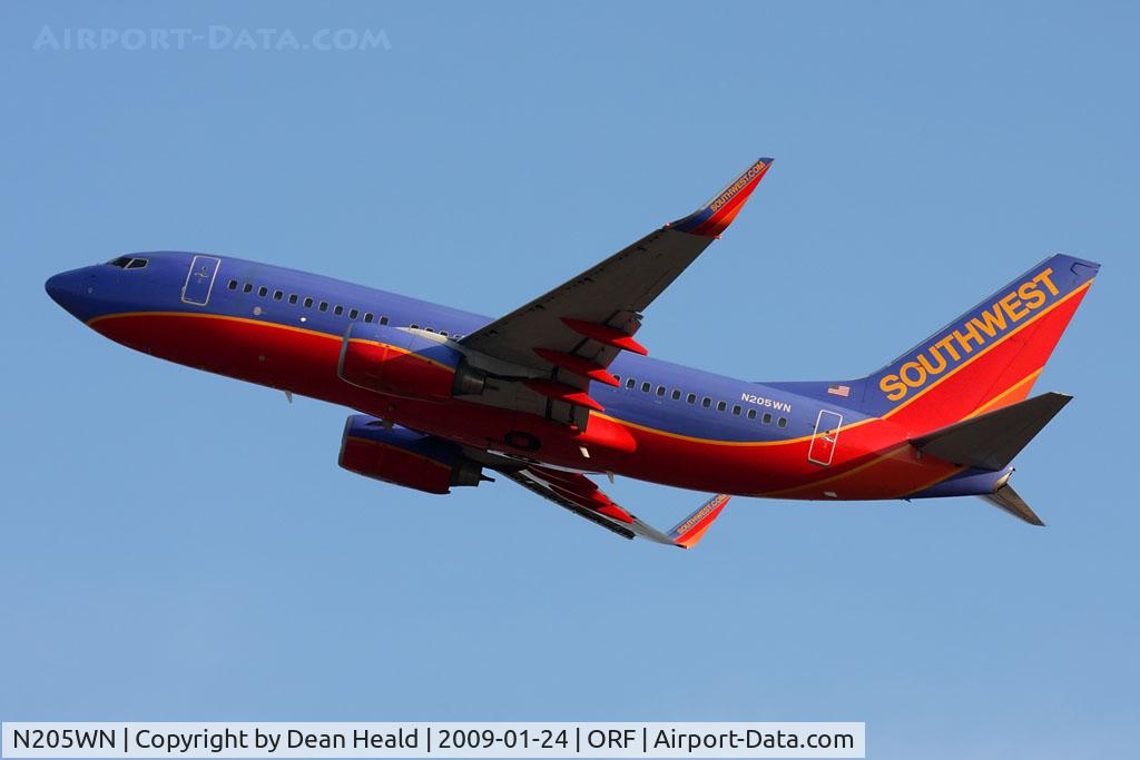 N205WN, 2005 Boeing 737-7H4 C/N 34010, Southwest Airlines N205WN (FLT SWA2022) climbing out from RWY 5 enroute to Chicago Midway Int'l (KMDW).