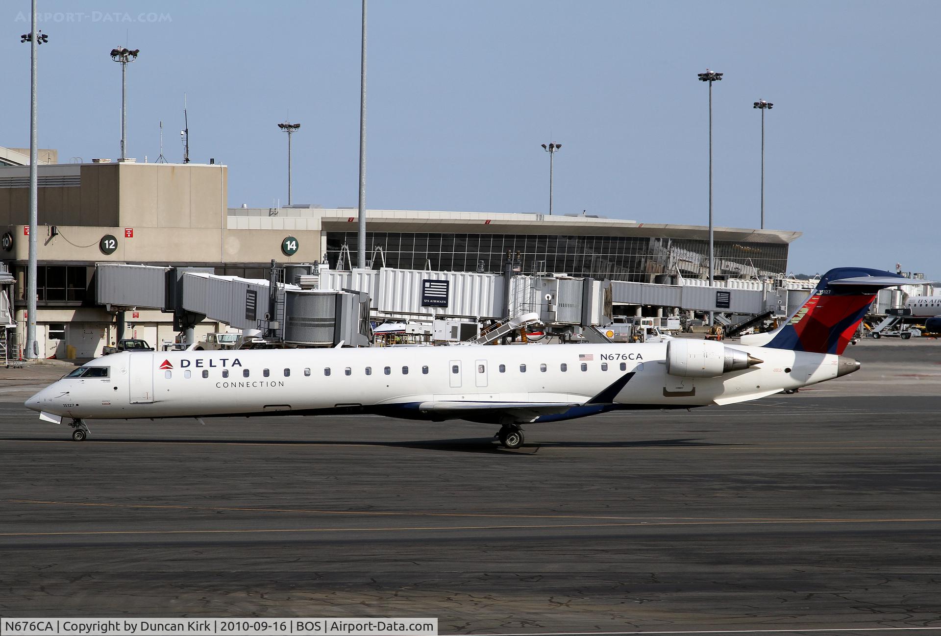 N676CA, 2007 Bombardier CRJ-900ER (CL-600-2D24) C/N 15127, Looks like a little paint is needed on the tail.