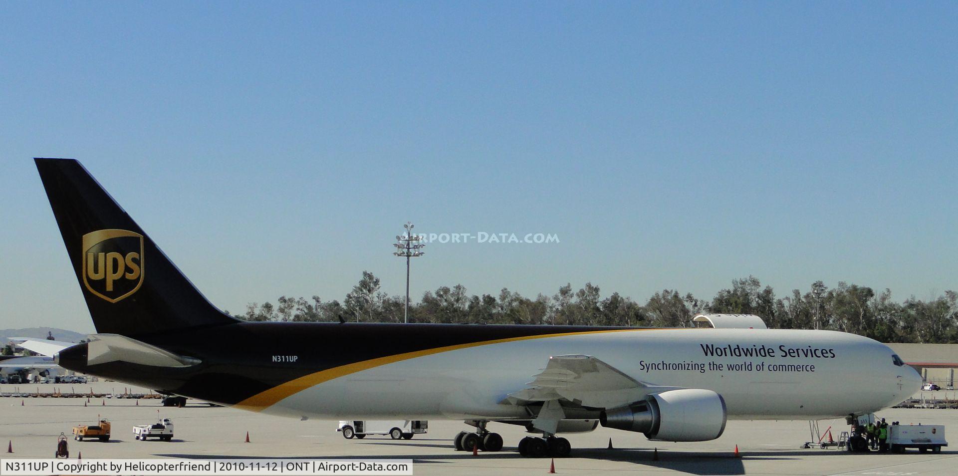 N311UP, 1996 Boeing 767-34AF C/N 27741, Parked in UPS parking area
