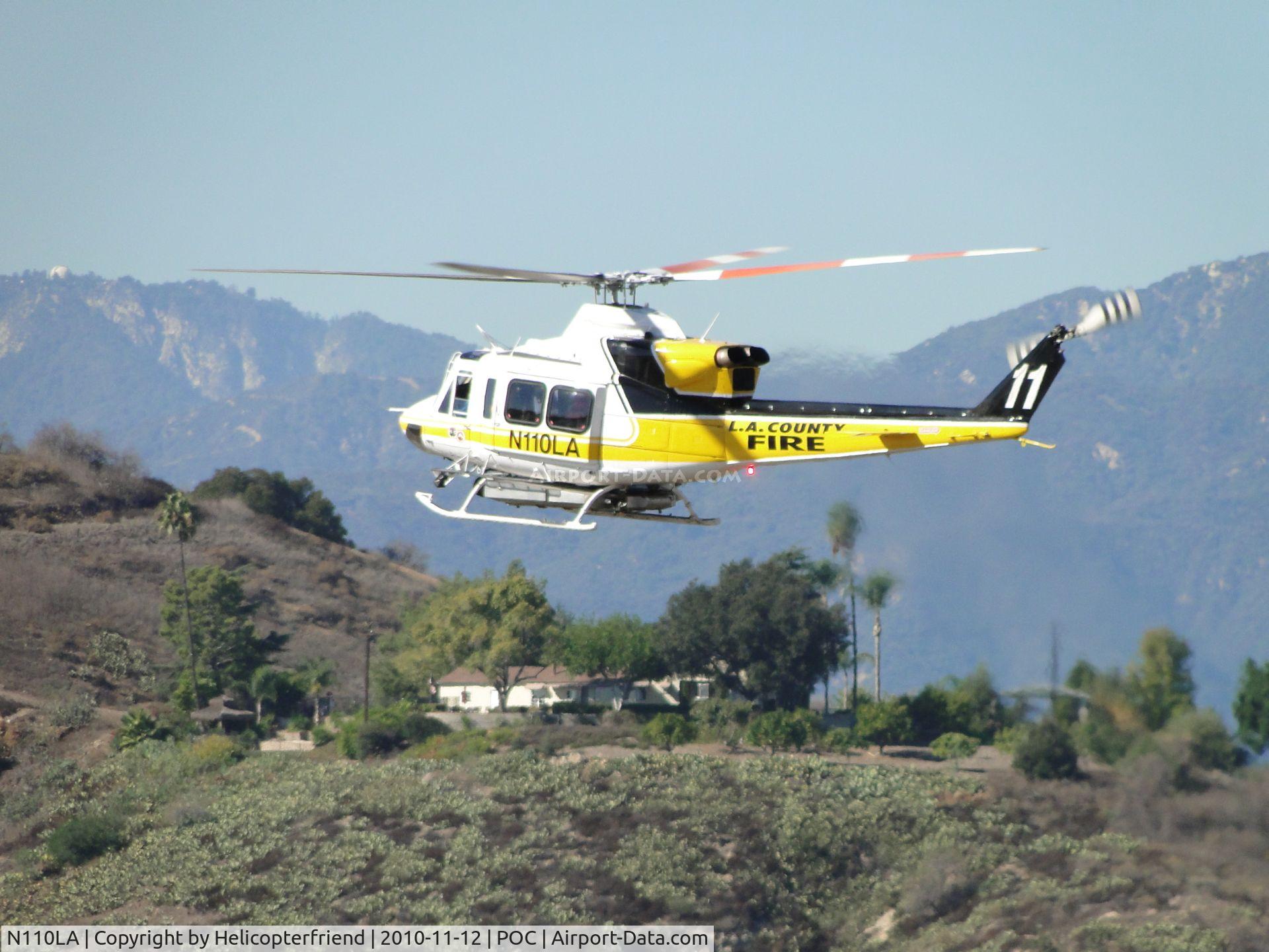 N110LA, 2005 Bell 412EP C/N 36392, Westbound, flaring to slow own prior to making a turn south to go to helipad