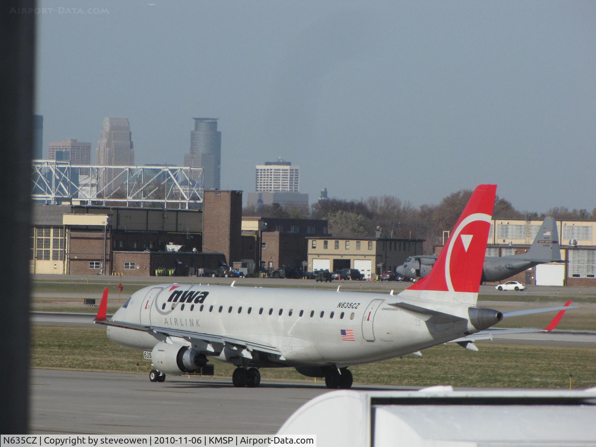 N635CZ, 2008 Embraer 175LR (ERJ-170-200LR) C/N 17000252, NWA Airlink Colours 06/Nov/2010 Taken from inside the terminal at MSP