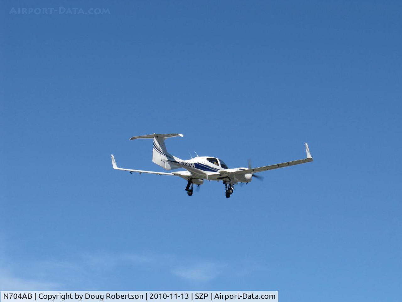 N704AB, 2006 Diamond DA-42 Twin Star C/N 42.091, 2006 Diamond Aircraft Ind. Gmbh DIAMOND DA-42D TWIN STAR, two Thielert Centurion TAE-125-01 1.7 turbo-charged 135 hp each Diesels, takeoff climb Rwy 04