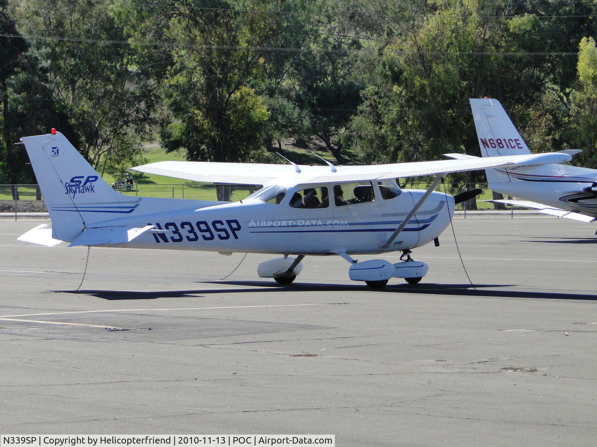 N339SP, 2003 Cessna 172S C/N 172S9496, Tied down and parked in transient parking