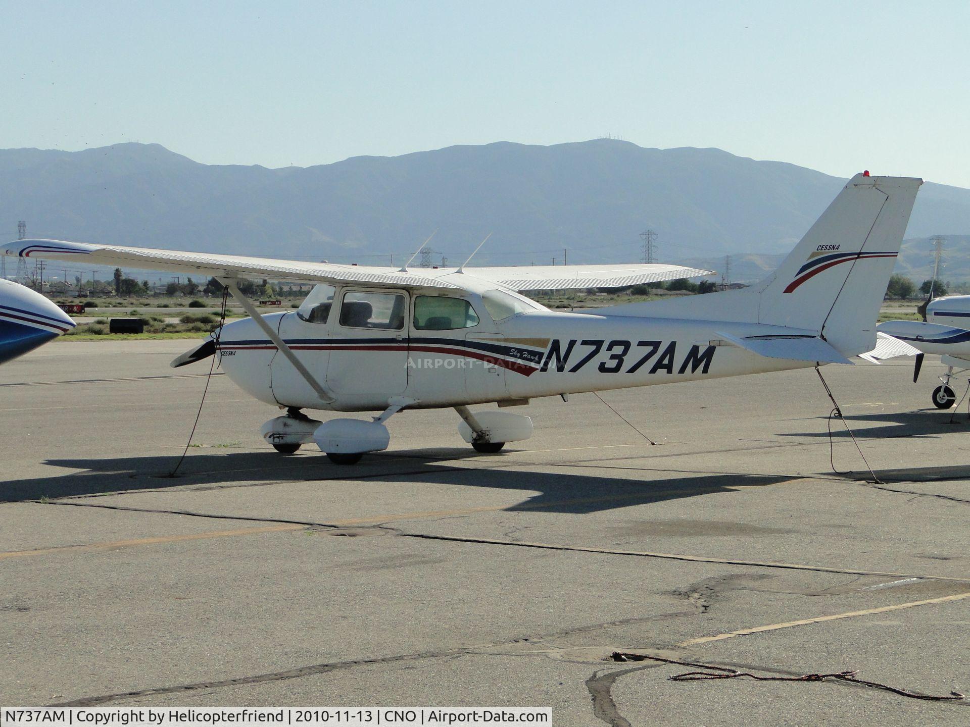 N737AM, 1977 Cessna 172N C/N 17269269, Parked east of the tower