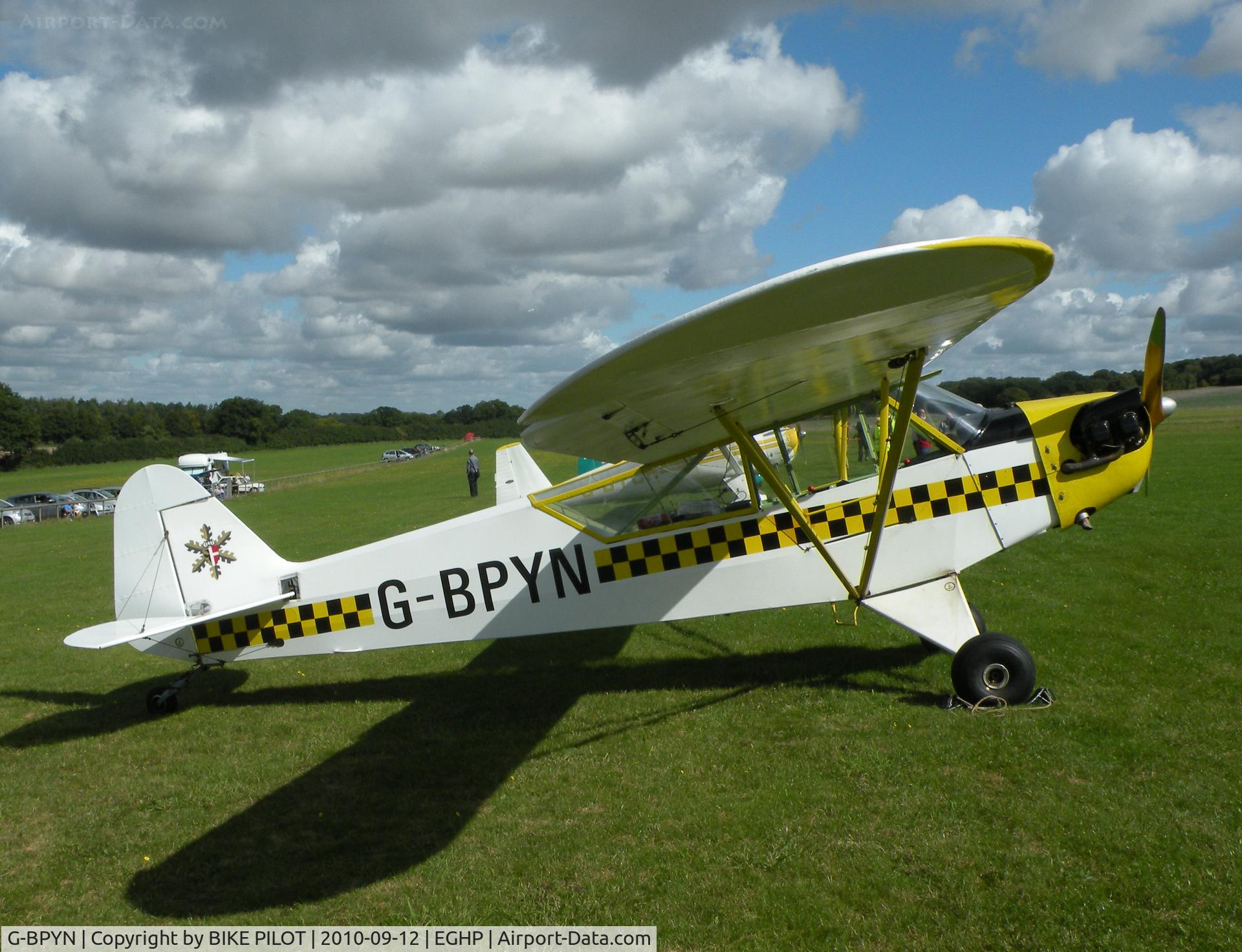 G-BPYN, 1943 Piper L-4H Grasshopper (J3C-65D) C/N 11422, Snazzy Color scheme on this Cub