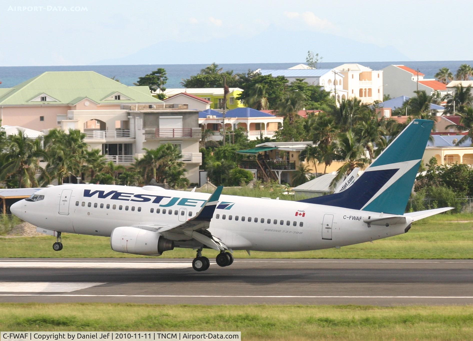 C-FWAF, 2002 Boeing 737-7CT C/N 32747, Canjet landing at TNCM runway 10
