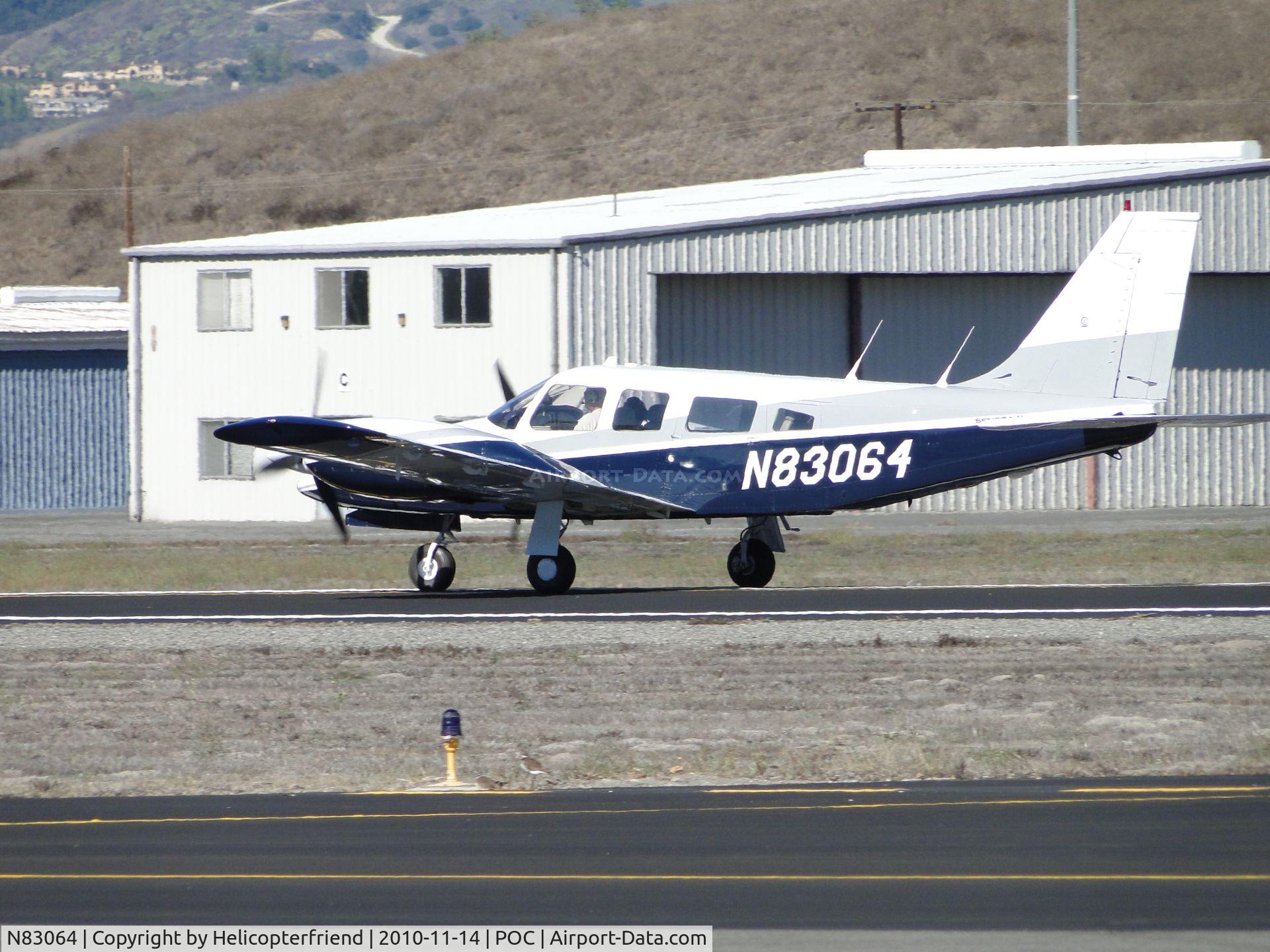 N83064, 1980 Piper PA-34-200T C/N 34-8170057, Rolling out after landing on runway 26L