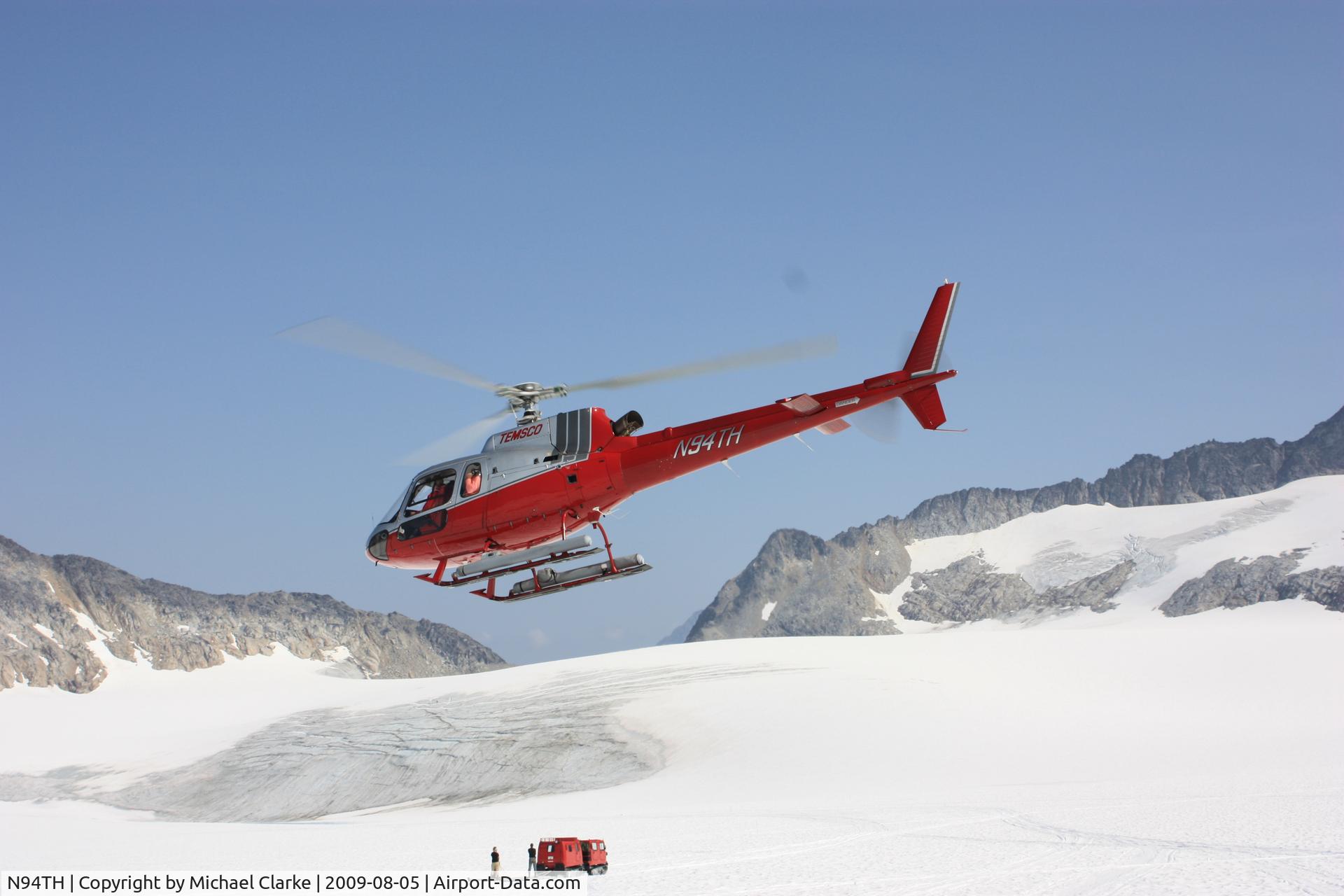 N94TH, 1991 Eurocopter AS-350B-2 Ecureuil Ecureuil C/N 2548, Taking off from the snow fields at Skagway Alaska
