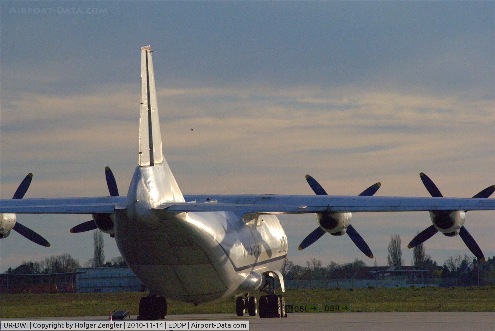 UR-DWI, Antonov An-12 C/N 1340106, Sunday rest for a white horse.