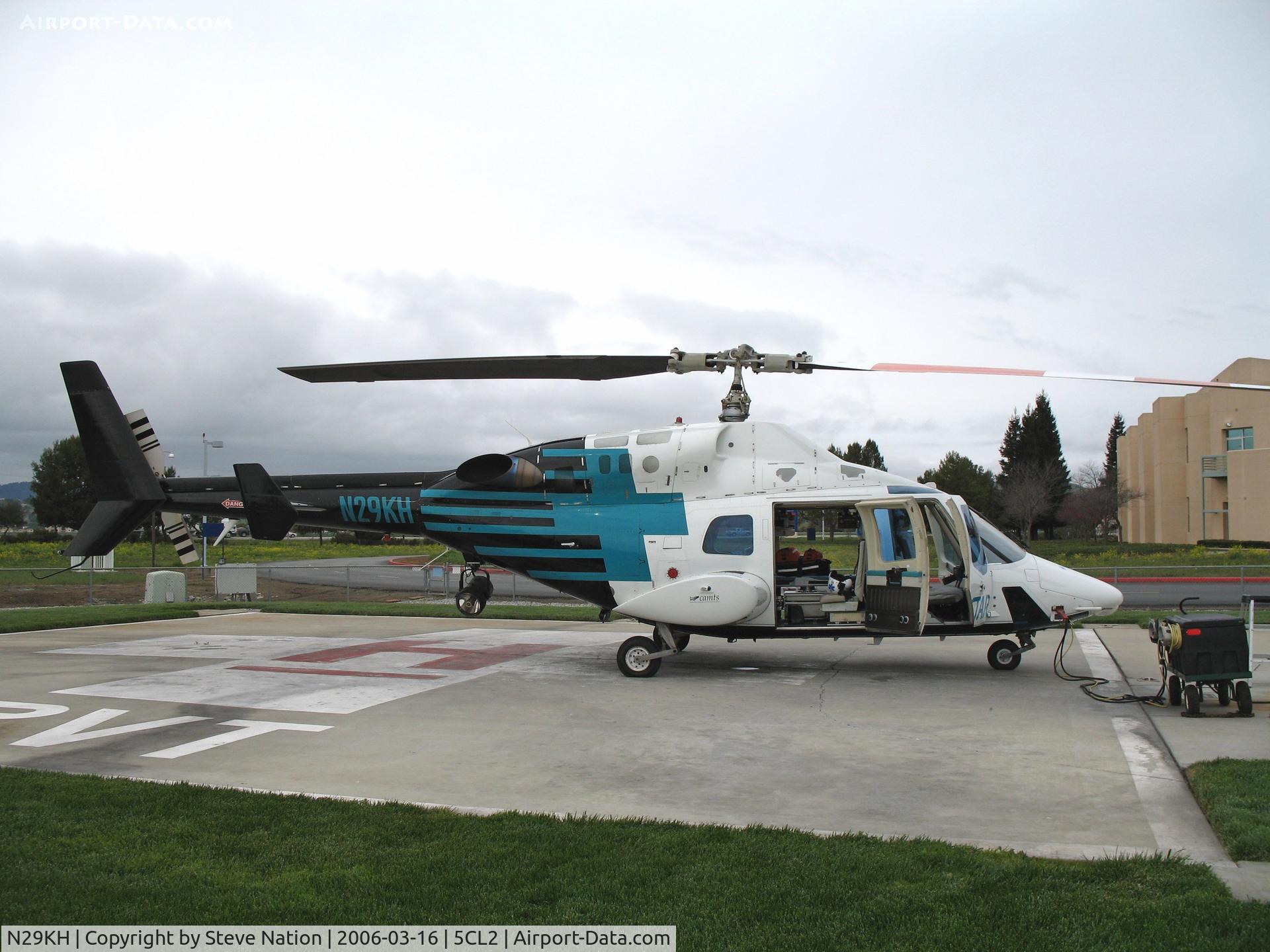 N29KH, 1981 Bell 222 C/N 47053, CALSTAR 1981 Bell 222 with doors open on standby @ St. Louise Regional Hospital Heliport, Gilroy, CA