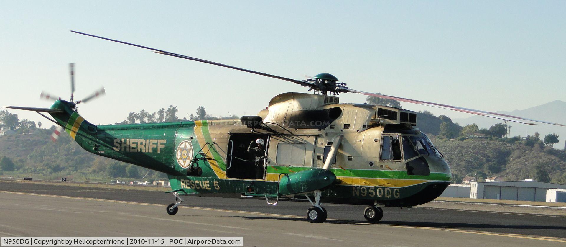 N950DG, Sikorsky UH-3H Sea King C/N 149724, Taxiing onto taxiway Sierra heading towards taxiway Coco
