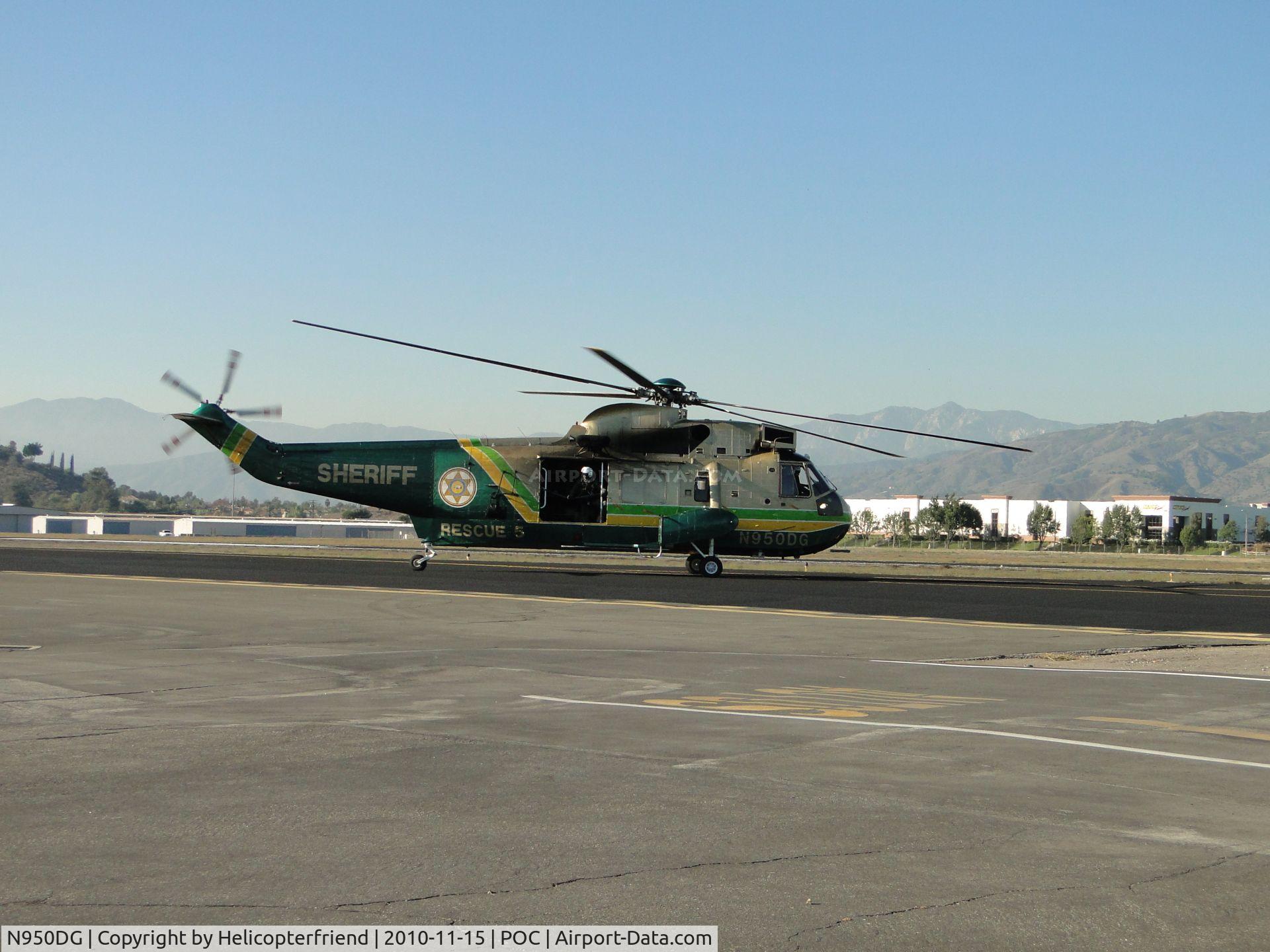 N950DG, Sikorsky UH-3H Sea King C/N 149724, Entering taxiway Coco headed to runway 26L for straight out departure