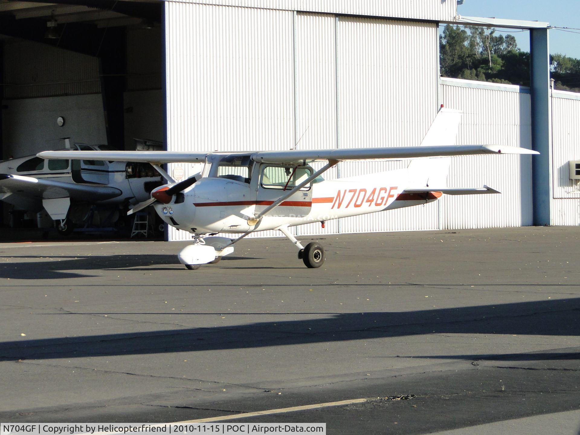 N704GF, 1976 Cessna 150M C/N 15078594, Parked by NAI hanger
