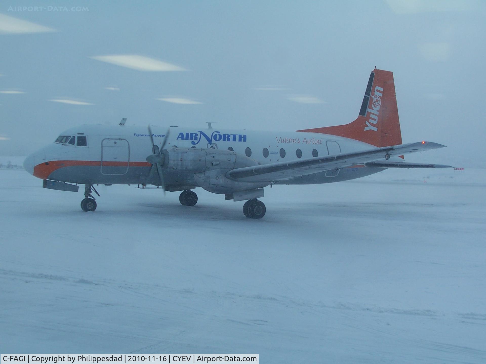 C-FAGI, 1971 Hawker Siddeley HS.748 Series 2A C/N 1699, Air North (Yukon's Airline) HS 748 departing Inuvik, NT 2010 Nov 16.  Apologies for the glare from the interior lighting at the airport.  It's not a picture-friendly facility.
