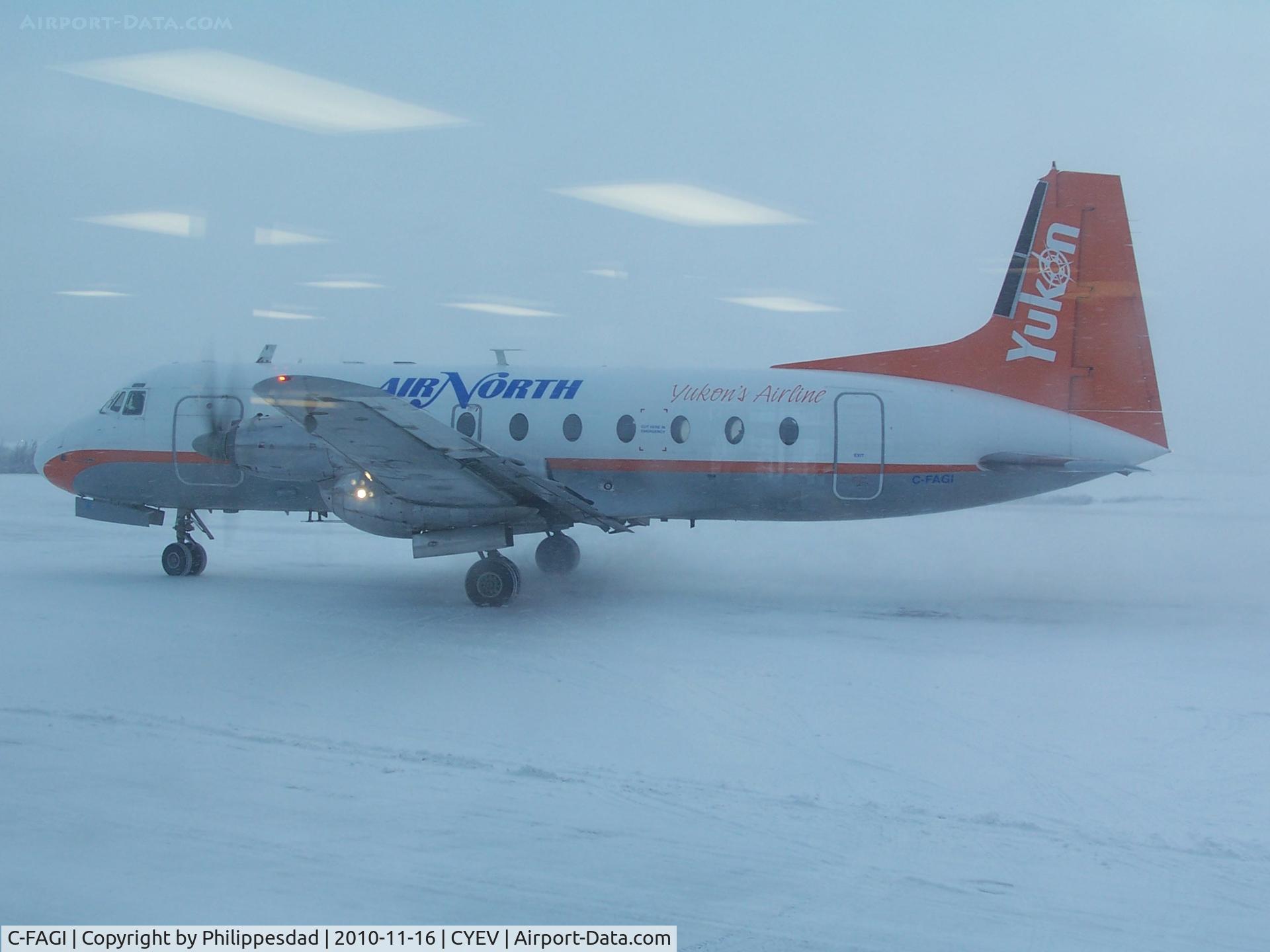 C-FAGI, 1971 Hawker Siddeley HS.748 Series 2A C/N 1699, Air North (Yukon's Airline) HS 748 departing Inuvik, NT 2010 Nov 16.  Apologies for the glare from the interior lighting at the airport.  It's not a picture-friendly facility.