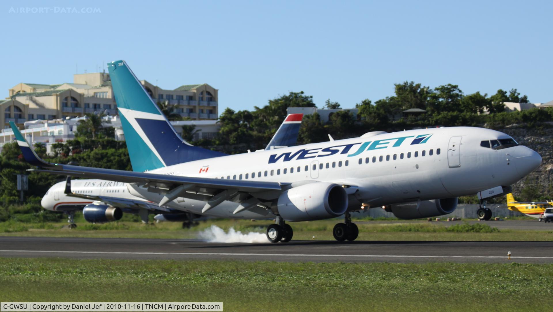 C-GWSU, 2009 Boeing 737-7CT C/N 36689, WestJet C-GWSU landing at TNCM
