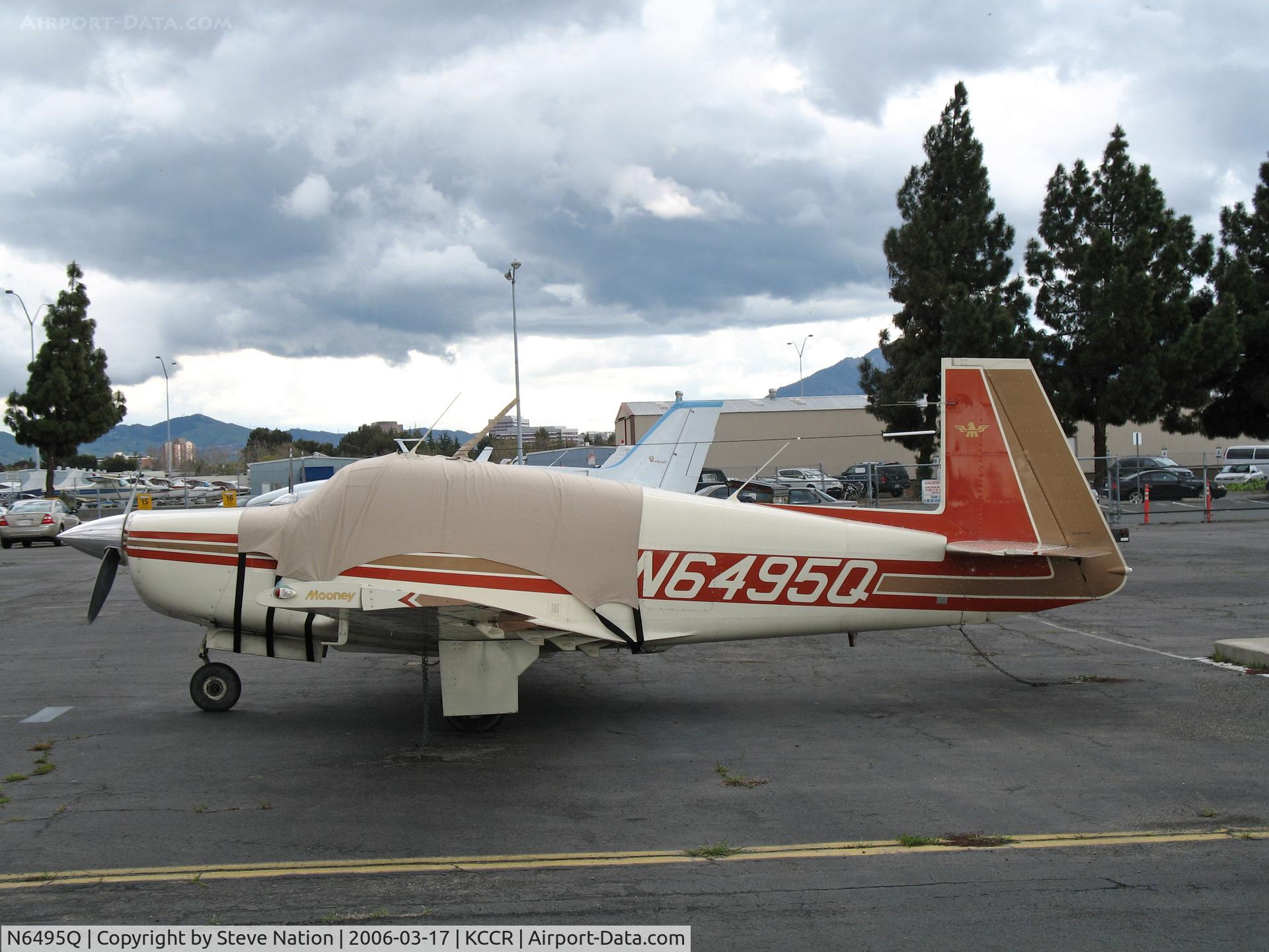 N6495Q, 1967 Mooney M20F Executive C/N 680037, Locally-based 1967 Mooney M20F with cockpit covered @ Buchanan Field, Concord, CA just before a storm