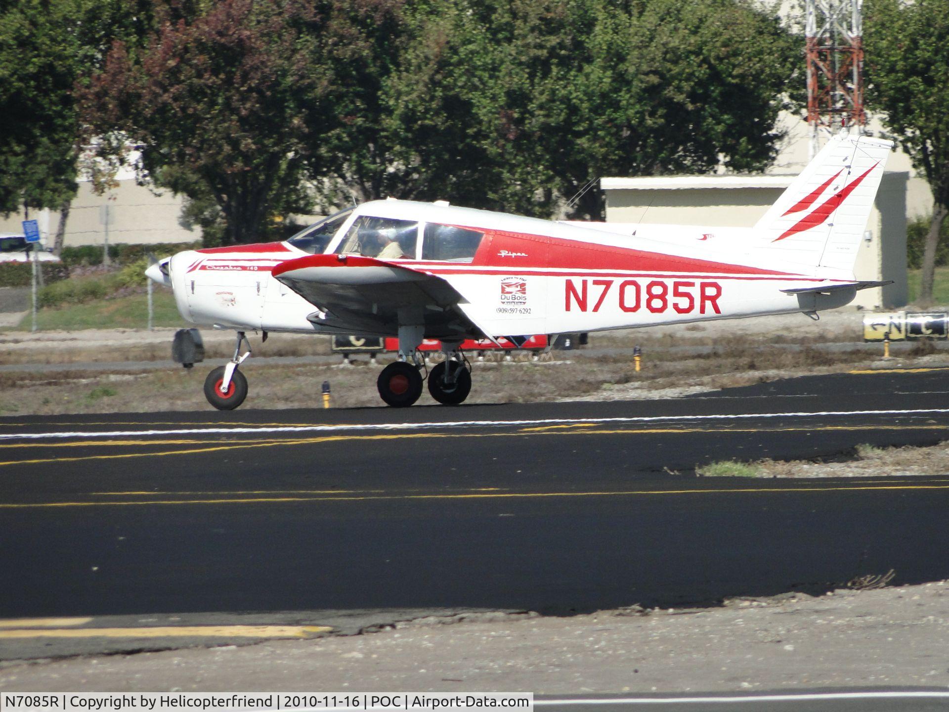 N7085R, 1966 Piper PA-28-140 Cherokee C/N 28-21788, Touching down at taxiway C and rolling out