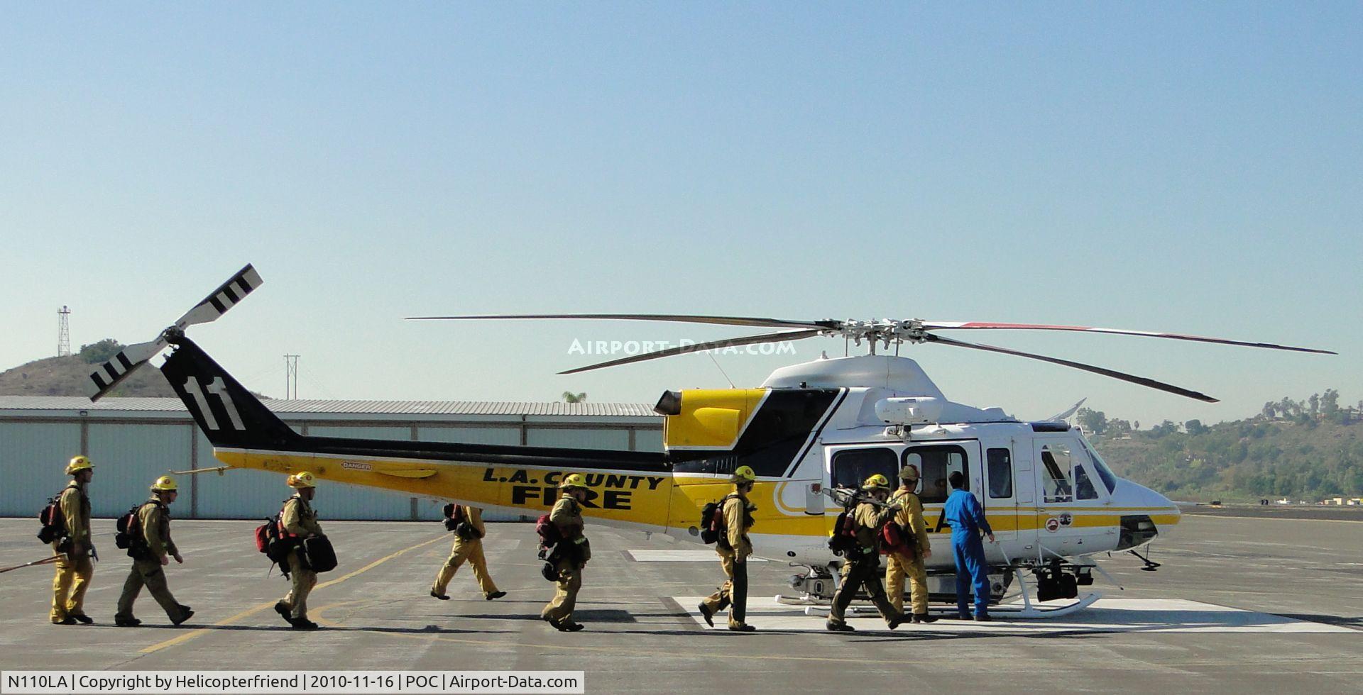 N110LA, 2005 Bell 412EP C/N 36392, Fire fighters being taken to ship for practice loading and unloading