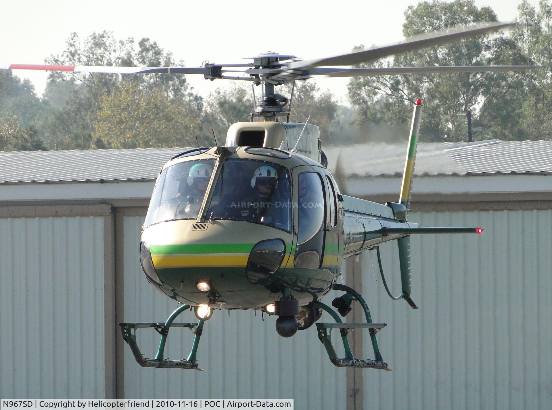 N967SD, 2003 Eurocopter AS-350B-2 Ecureuil C/N 3678, All three looking to LACO Firebird while preparing to turn northbound and land at helipad